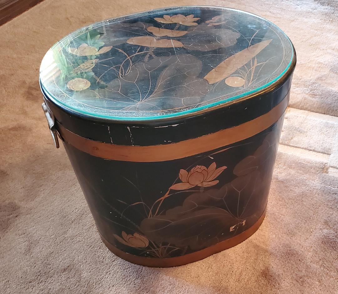 Vintage Asian Side Table With Glass Top / Decorative Asian Hidden Storage Table With Original Glass Top.
This Piece Has A Beautiful Vintage Asian Design. The Overall Black Wooden Side Table  / Asian Table With Storage Has A Lid And Original Oval