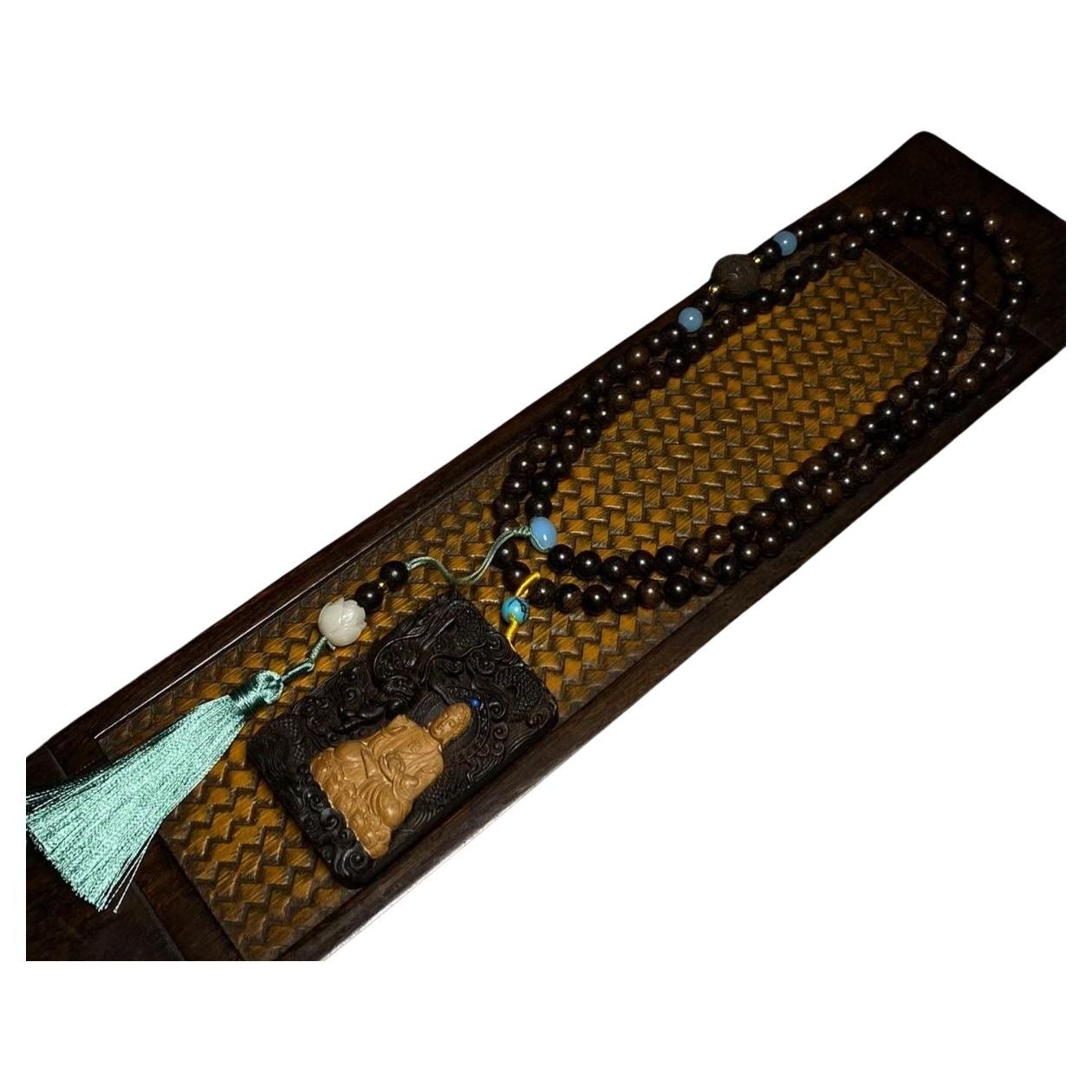 Vintage Asian Wood 108 Beads Necklace with Carved Dragon Buddha Pendant – Handmade Spiritual Mala Beads

Enhance your spiritual journey with this exquisite Vintage Asian Wood 108 Beads Necklace, featuring a beautifully hand-carved Dragon Buddha