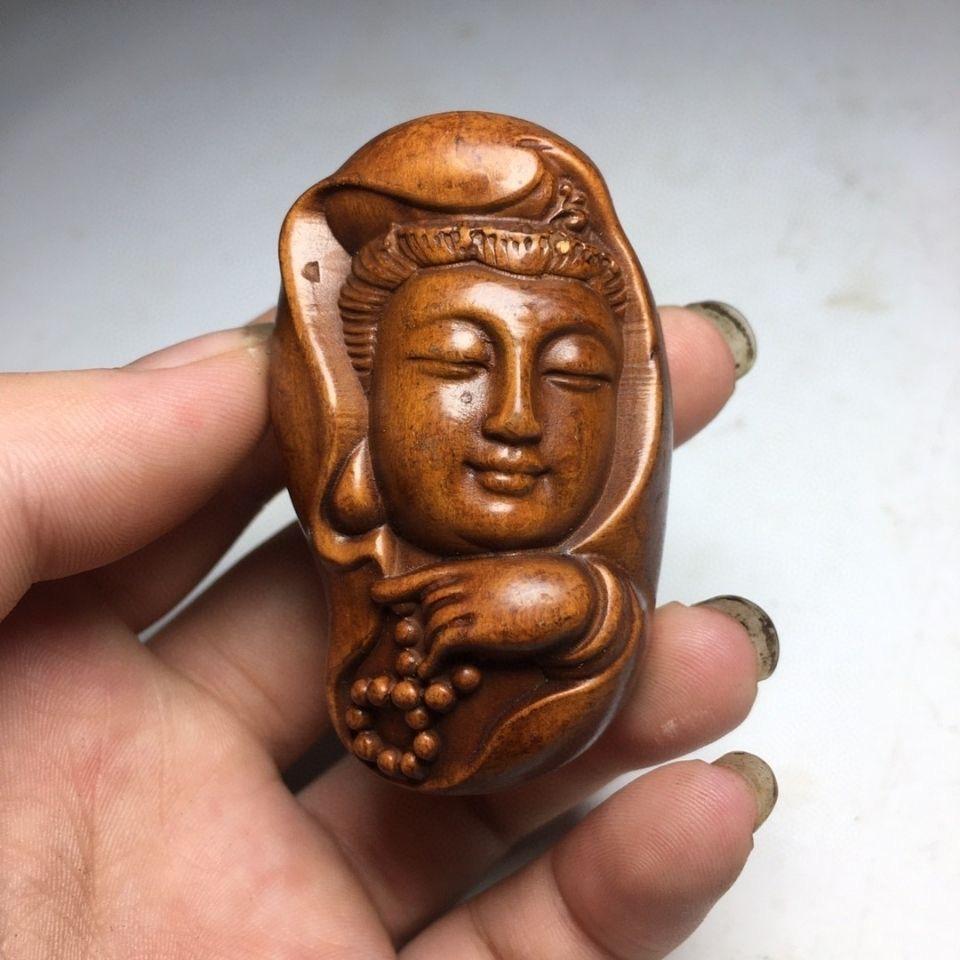 Vintage Asian Wood Carving Guan Yin Buddha Handheld Ornament – Symbol of Compassion and Serenity

This finely detailed vintage handheld ornament features the Guan Yin Bodhisattva, lovingly hand-carved from natural wood in traditional Asian style.