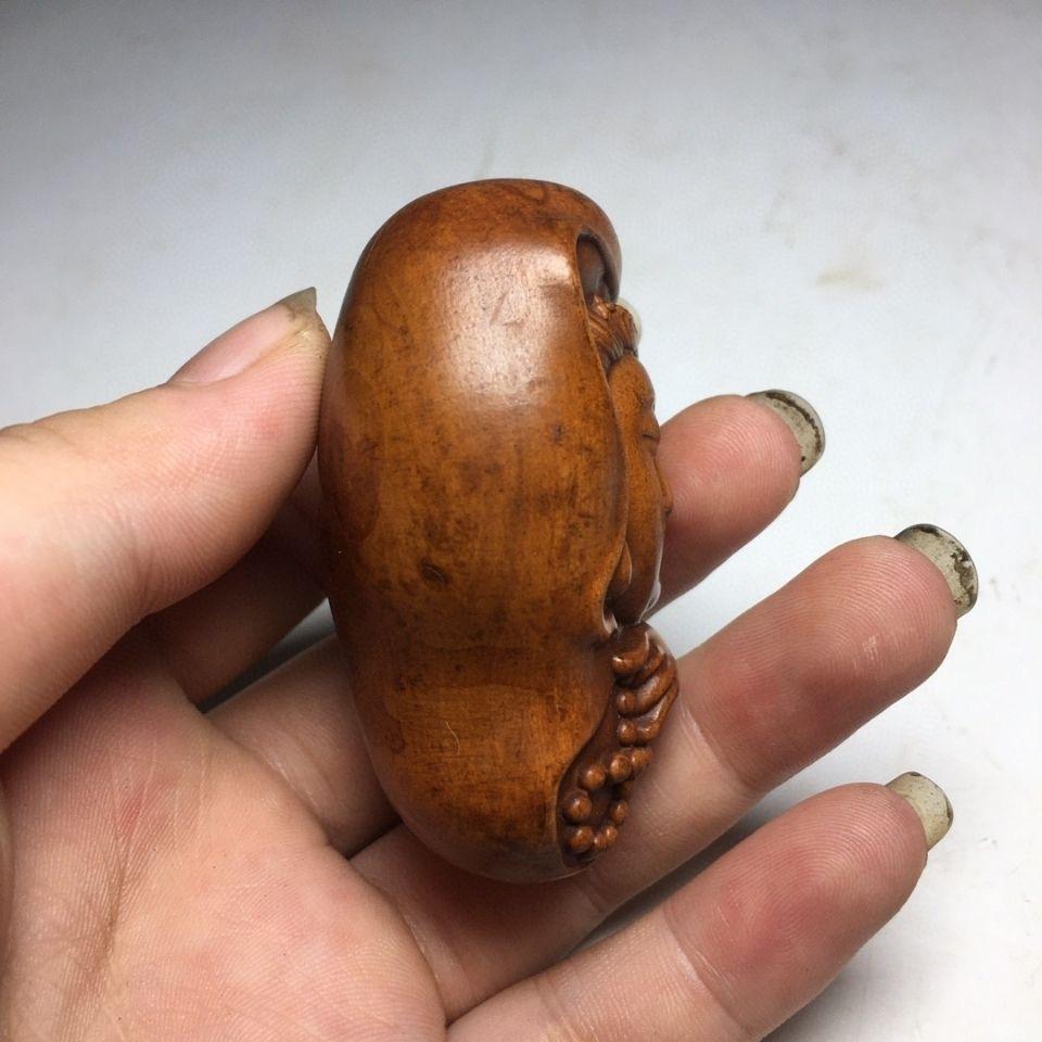 Vintage Asian Wood Carving Guan Yin Buddha Handheld Ornament For Sale 1