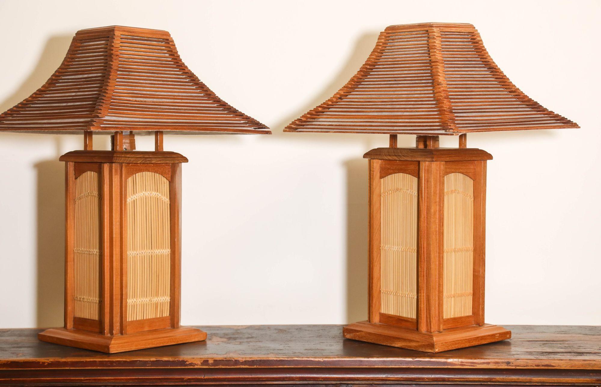 Vintage Asian Japanese Wood Table Lamps Handcrafted with panel of wood, rattan and woven straw, the matching shade looks like a pagoda.
Inspired by the Asian Japanese homes.
Will fit well in an Art and Craft Frank Lloyd style home or mountain