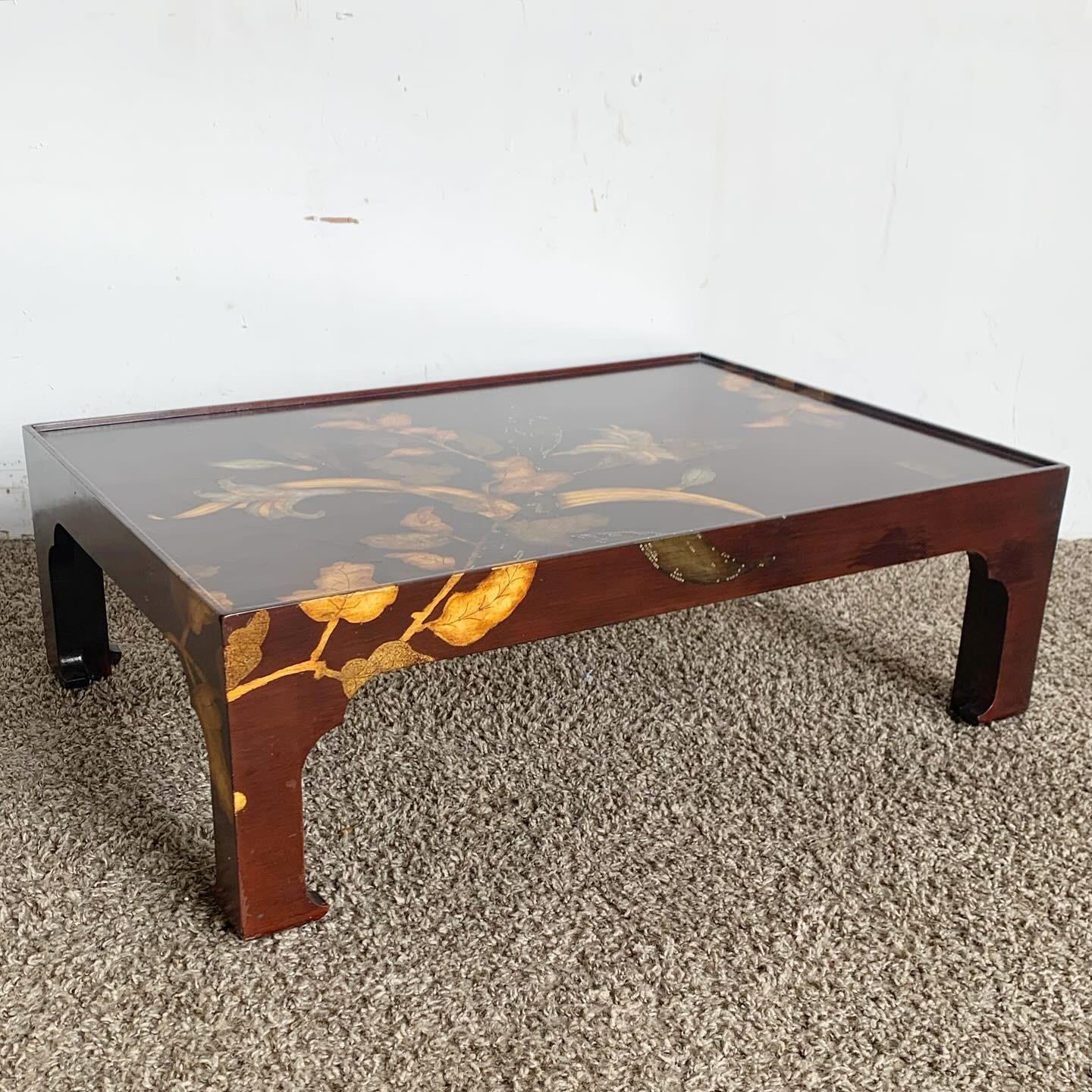 The Vintage Asian Wooden Inlaid Prayer Table is a stunning display of traditional Asian craftsmanship. Featuring intricate wooden inlays with delicate foliage designs, it reflects the beauty of natural wood shades and grains. Sturdy and elegantly