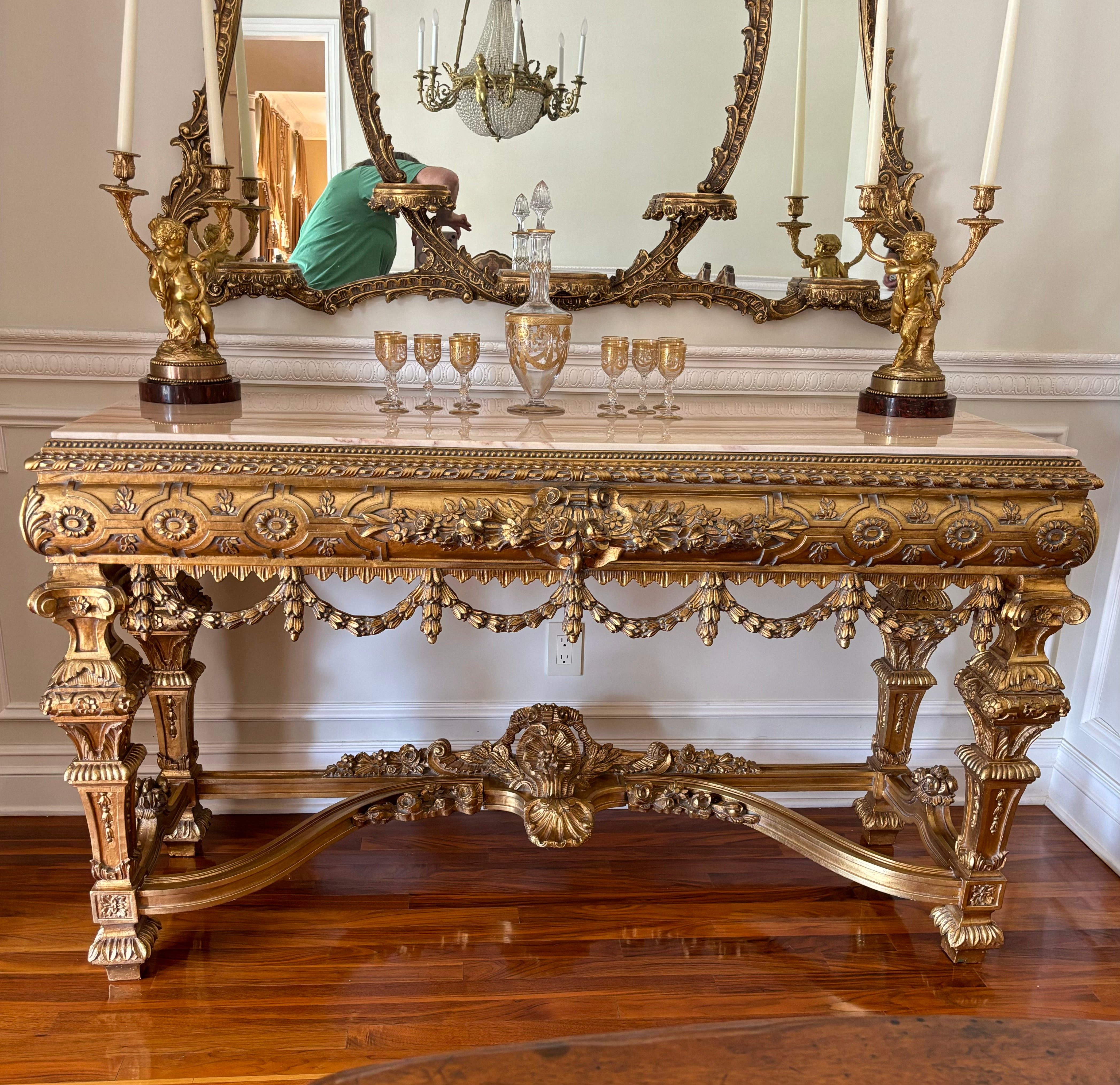 This hand carved console table is truly a work of art. Asnaghi Interior Furniture has been handcrafted since 1916 in Italy. Every piece of furniture is a real work of art, with intrinsic value, peerless in design and execution, and will become