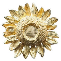 Spilla Girasole vintage Asprey in oro giallo 18 carati