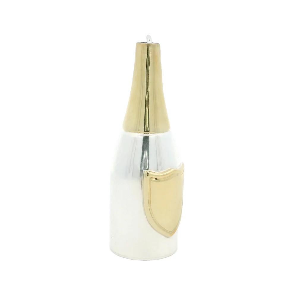 Asprey & Garrard Champagner-Stäbchen, circa 1998

Dieser versilberte und gelbvergoldete Champagner-Swizzle-Stick hat die Form einer Champagnerflasche.

Das Stäbchen selbst ist geschickt in der silbernen Champagnerflasche versteckt und kann bei