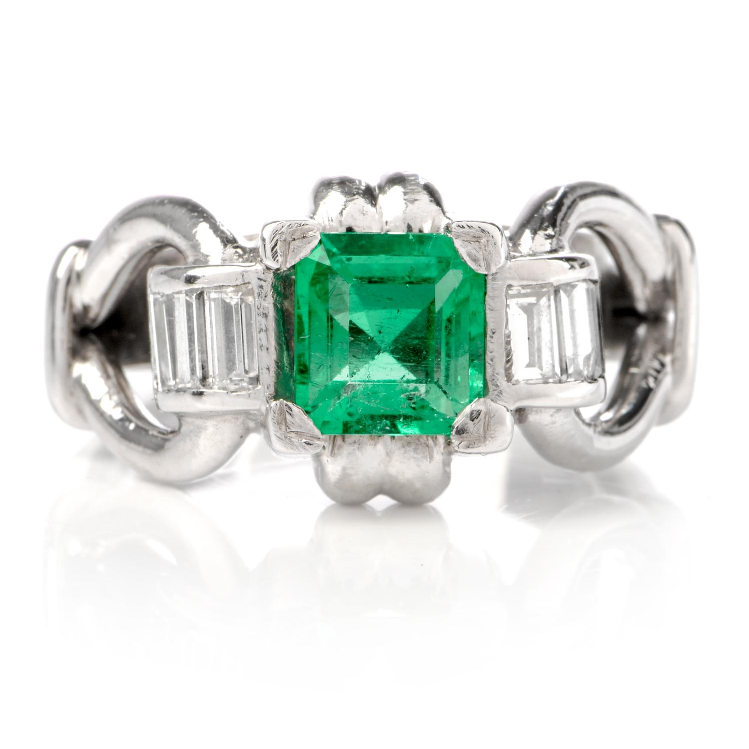 This vintage emerald and diamond ring is crafted in solid platinum, weighing approximately 12.2 carats and measuring 11mm x 6mm high. Displaying one centered prong-set Asscher cut vibrant Colombian emerald, weighing approximately 1.15 carats.