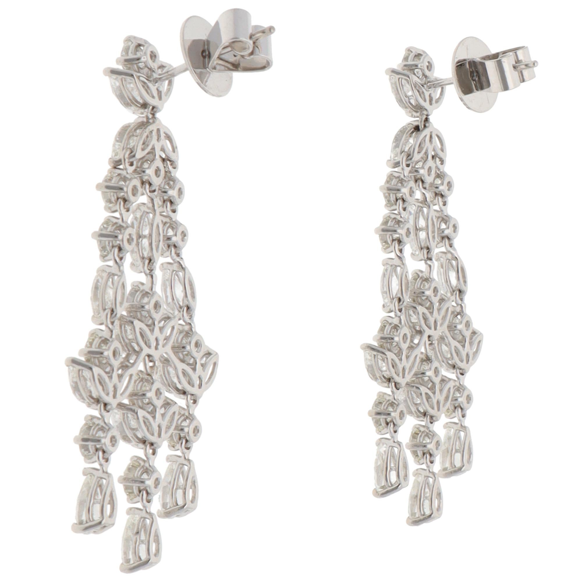 A truly stunning pair of Assil diamond drop earrings set in 18k white gold.

The earrings have a wonderful chandelier motif set with 62 round brilliant-cut and marquise-cut diamonds. The diamonds create elegant floral details within the chandelier.