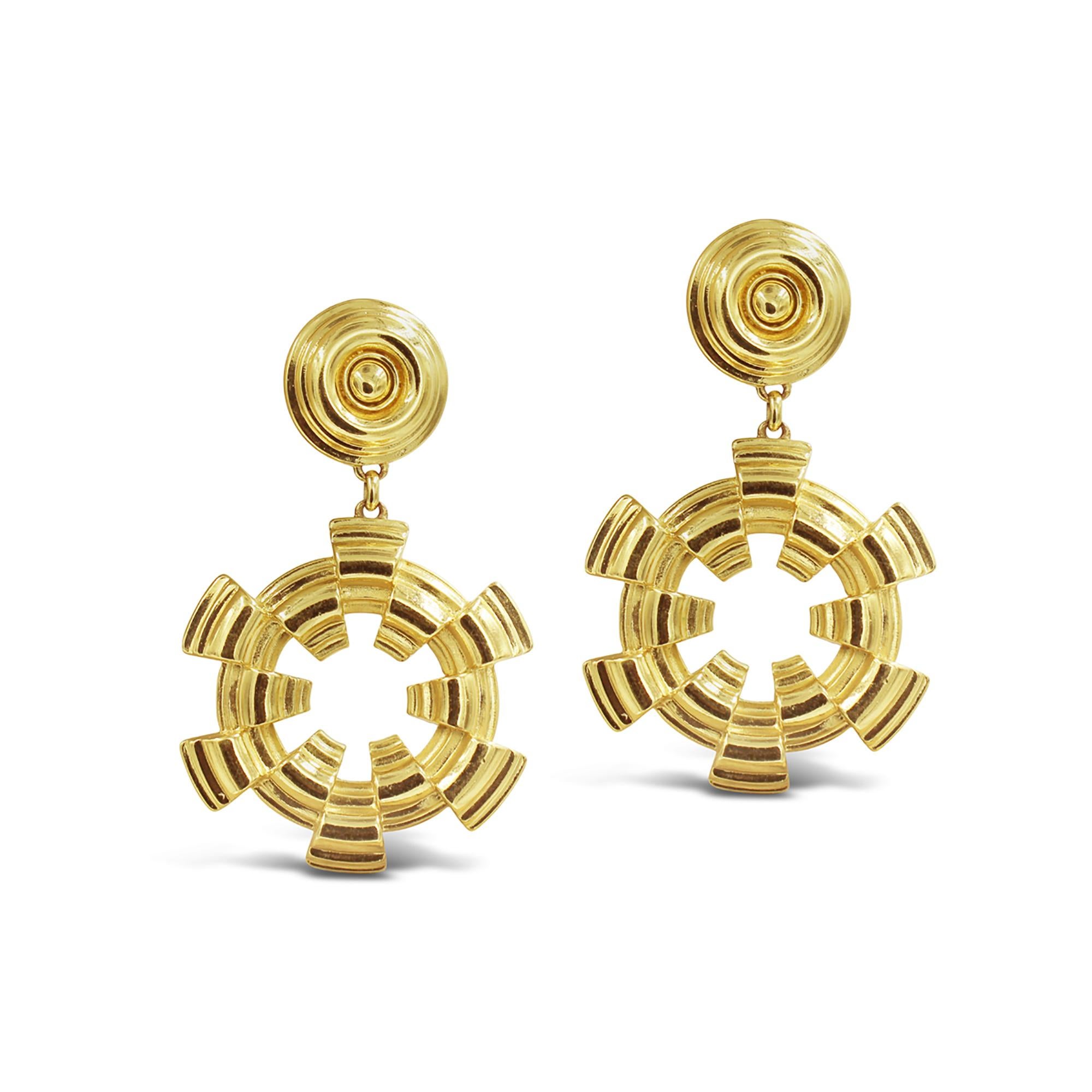 Vintage Atalante Heavy Gold Tone Hoops. Made in France.  Atalante Made Jewelry for YSL.  Well-made and Heavy.   Clip On.  These are so well-made and so chic.  These are the epitome of what walked down the runways of Chanel and Yves Saint Laurent in