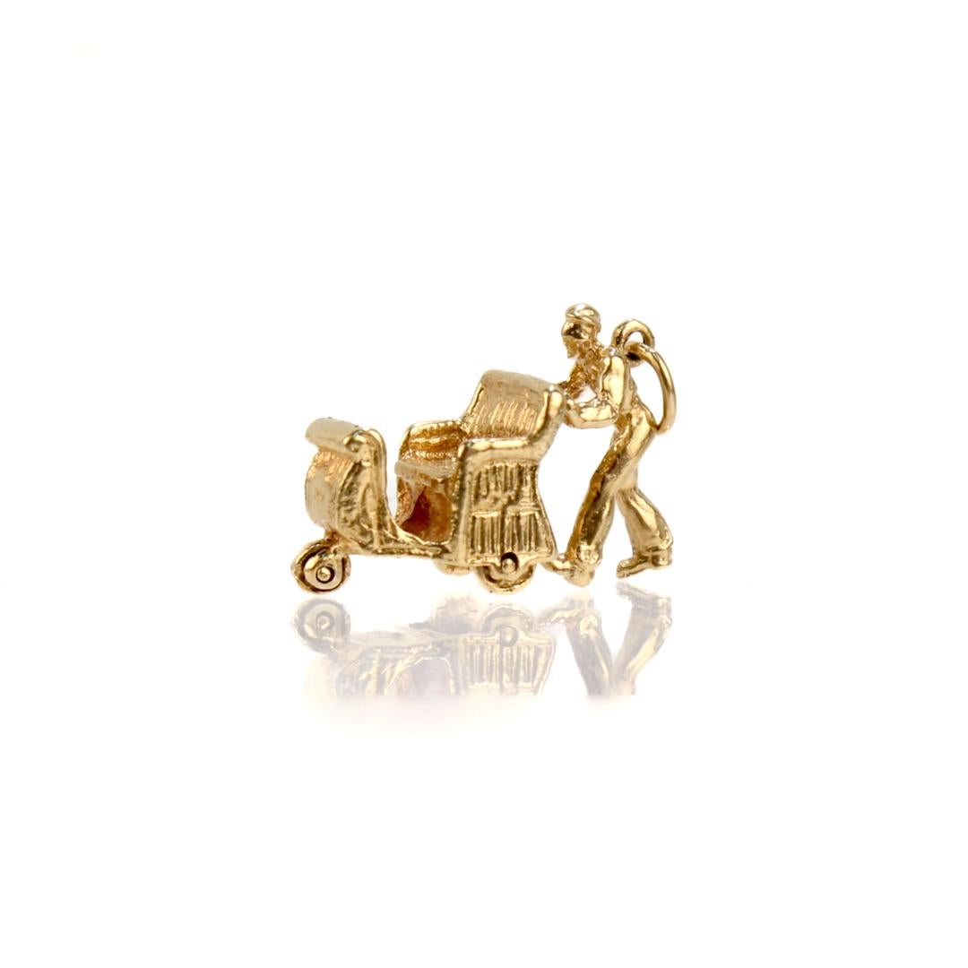 A fine vintage 14 karat gold charm for a charm bracelet. 

In the form of a Atlantic City boardwalk push cart.

Simply a wonderful charm!

Date:
Mid-20th Century

Overall Condition:
It is in overall good, as-pictured, used estate condition with some