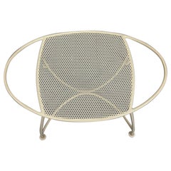Panchina vintage a forma di atomica di colore bianco sporco