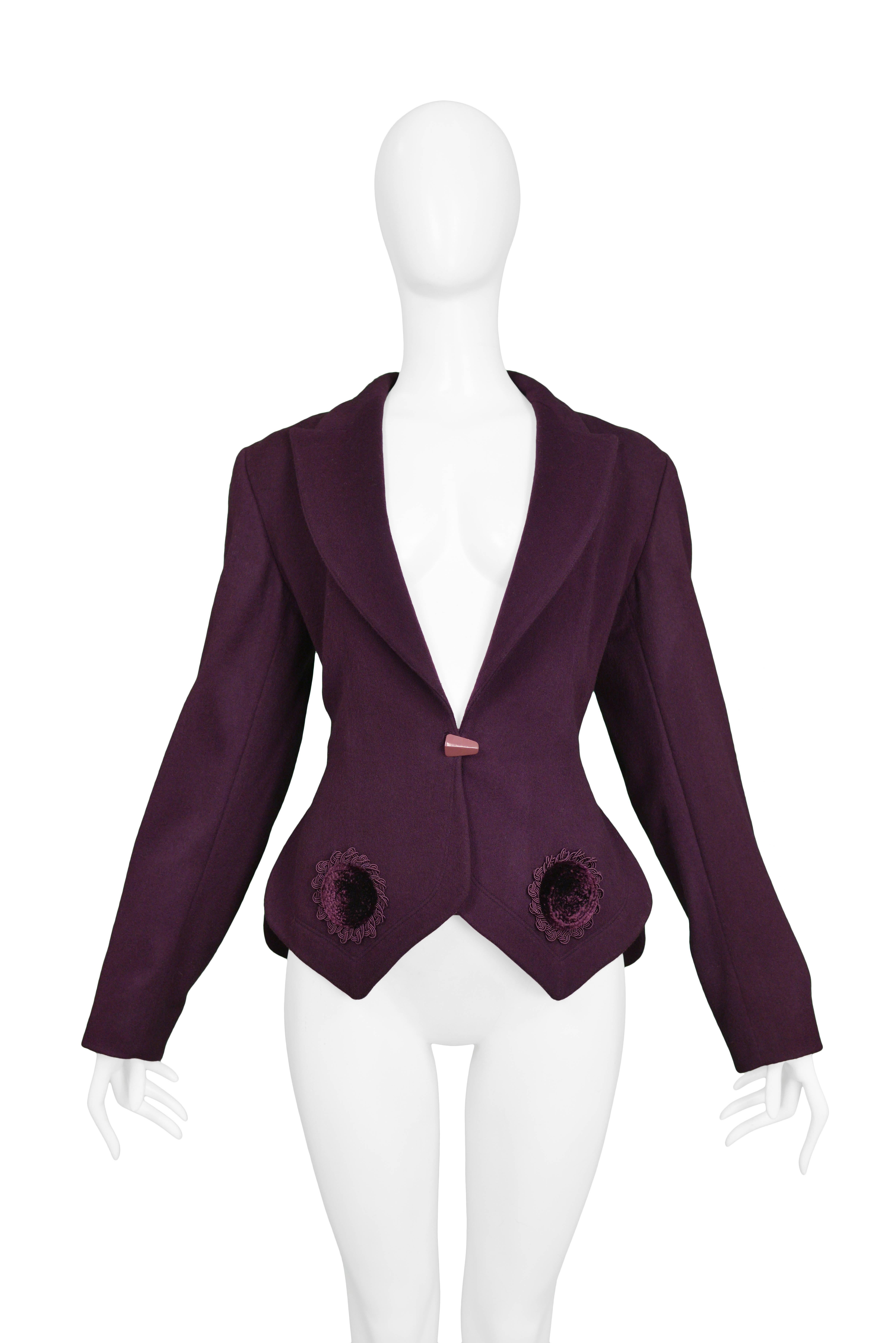 Vintage aubergine purple Azzedine Alaia wool fitted blazer featuring raised velvet appliques at hem, classic lapel collar, straight sleeves, and single button closure at front. Collection 1991.

Condition : Deadstock Vintage

Size: