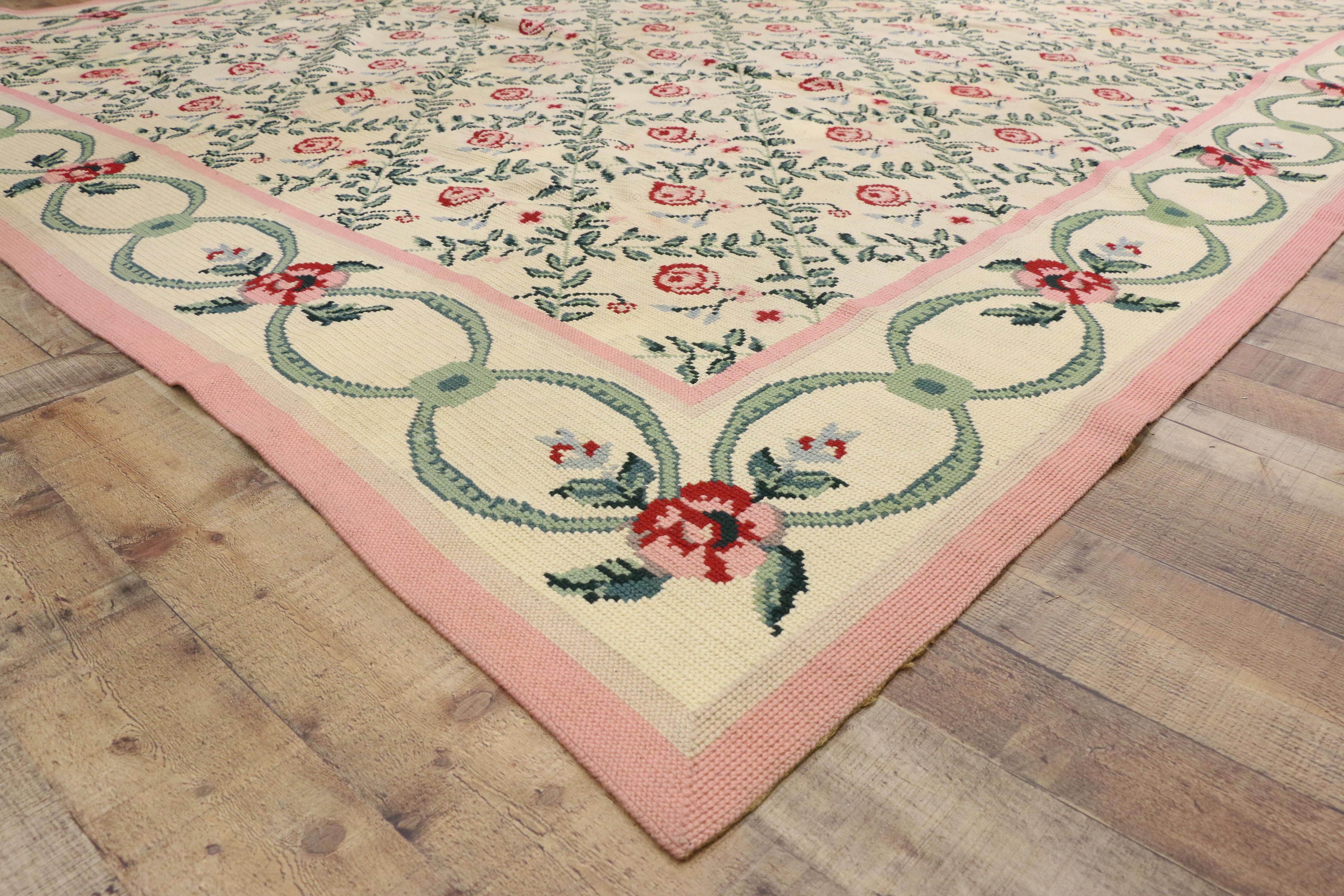 77205 Vintage French Aubusson Floral Trellis Needlepoint Chinese Rug with Chintz Style. Drawing inspiration from Mario Buatta and Chintz style, this needlepoint Aubusson style rug beautifully showcases a timeless floral trellis design. Pink rosebuds