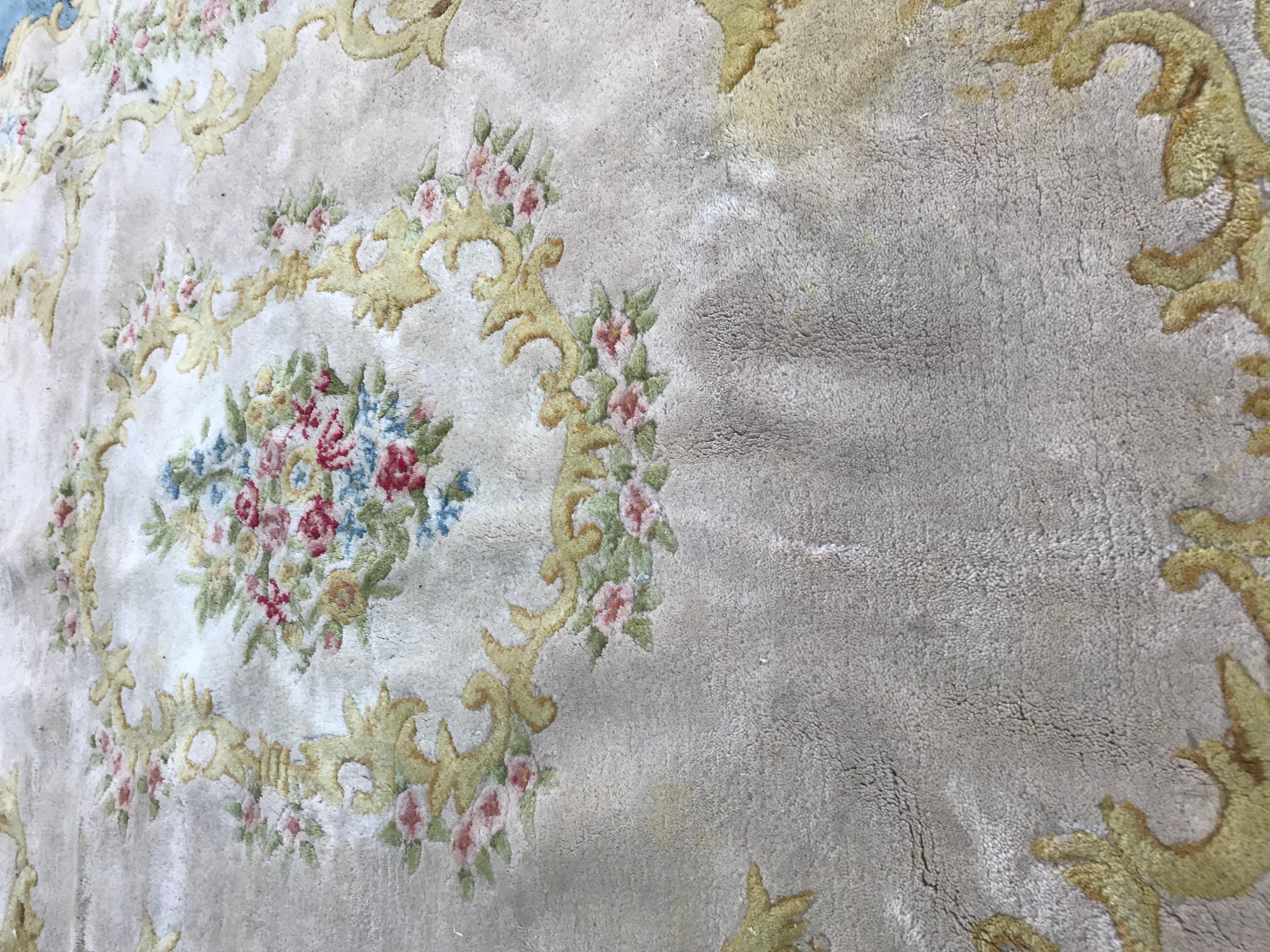 Beautiful room size Savonnerie style rug, with beautiful floral design and nice colors with blue, red, pink, yellow and green, entirely hand tufted with wool velvet on cotton foundation.

 