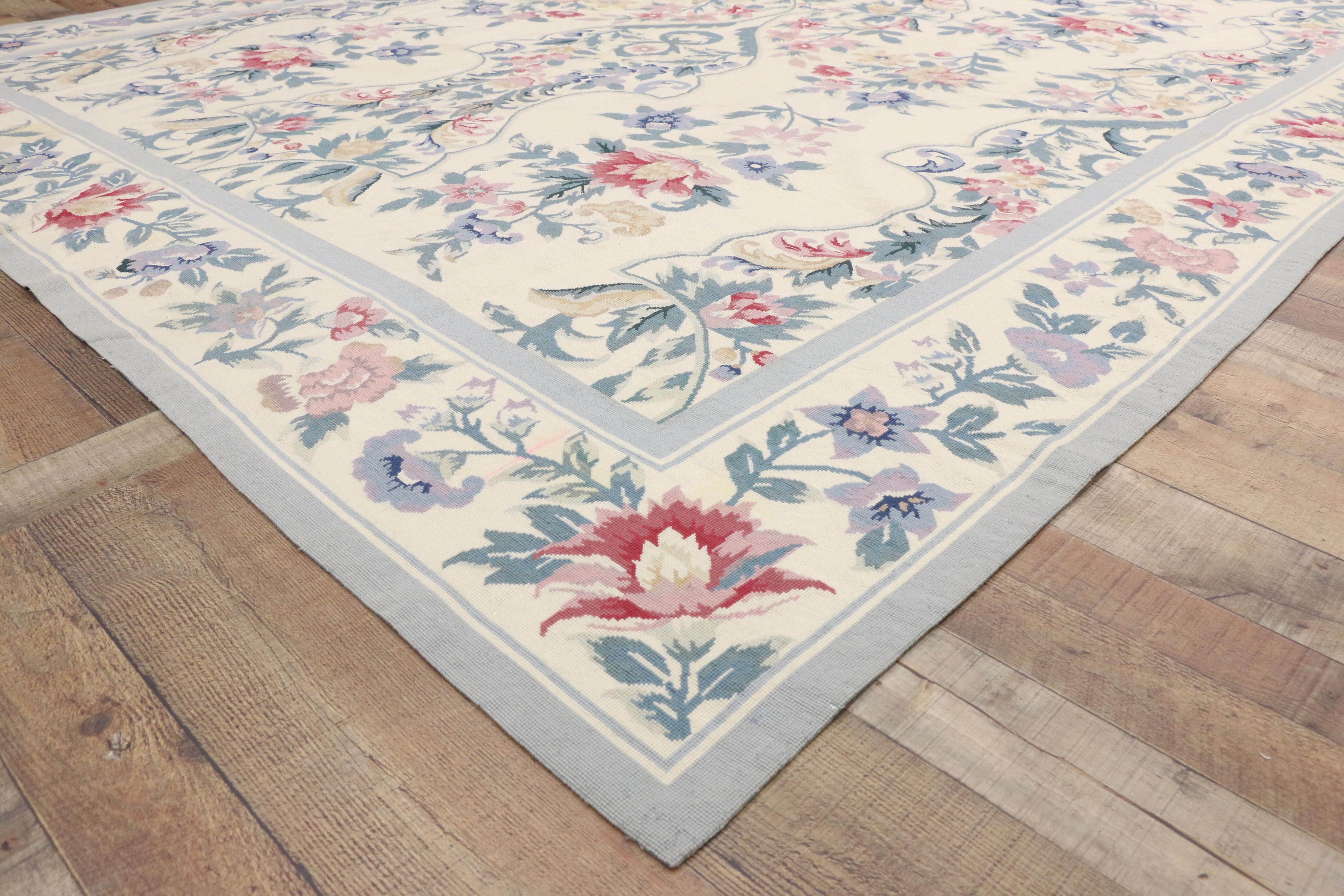 77204 Vintage French Aubusson Style Needlepoint Chinese Rug with Chintz Style. Drawing inspiration from Mario Buatta and Chintz style, this needlepoint Aubusson style rug beautifully showcases a timeless floral design. An all-over pattern of