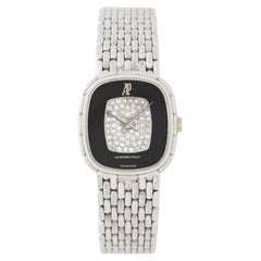 Orologio d'epoca Audemars Piguet in oro bianco 18 carati con onice e pavé di diamanti Orologio d'epoca Audemars Piguet in oro bianco 18 carati con onice e pavé di diamanti