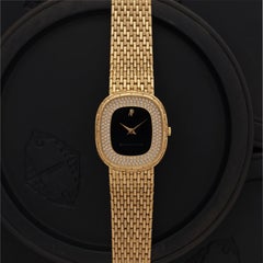 Vintage Audemars Piguet 18 Karat Yellow Gold and Onyx and Pavé Diamonds Watch