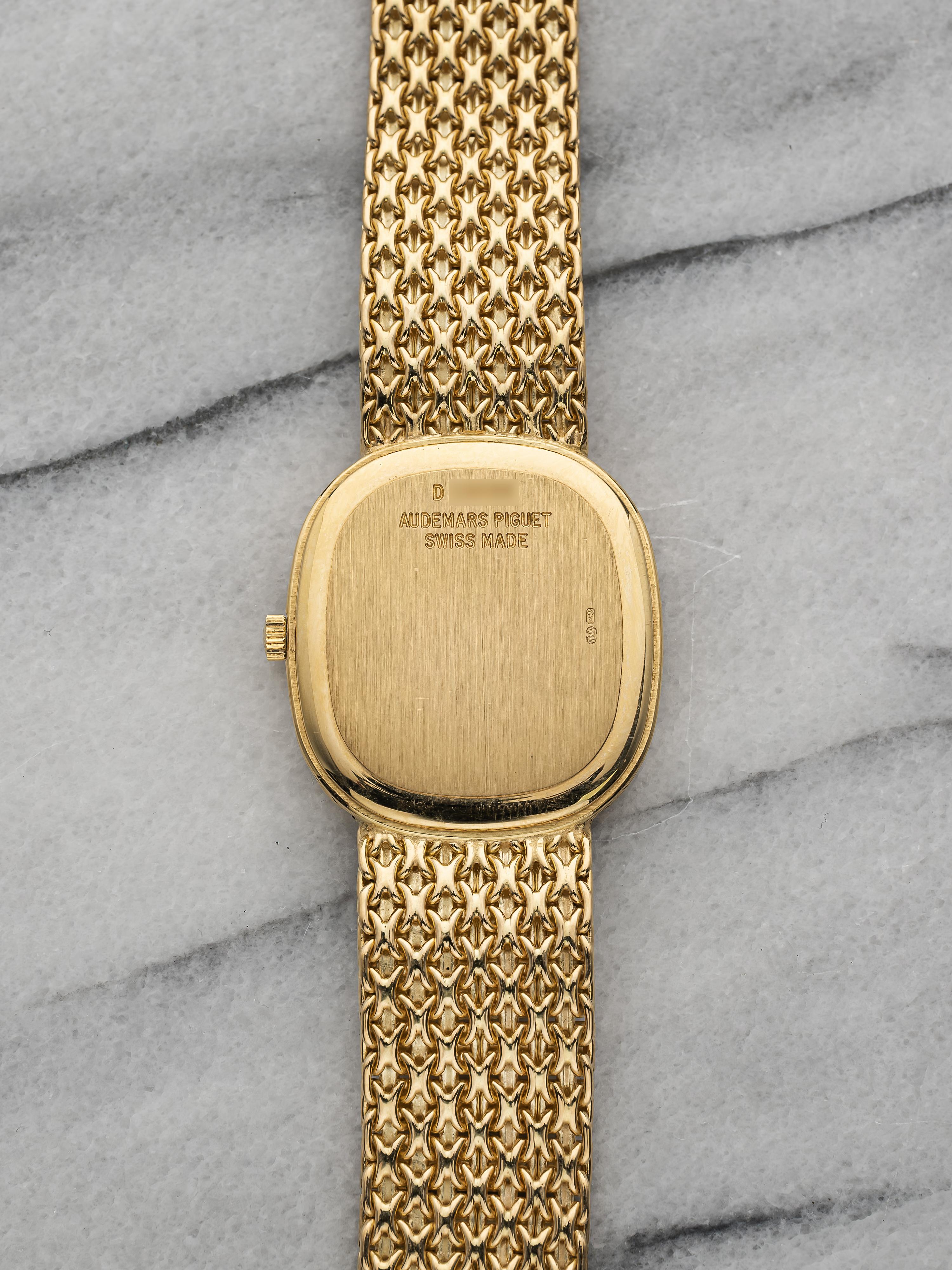 Vintage Audemars Piguet Puzzle años 90 Esfera champán Cuerda manual Oro de 18 quilates Caja de 28 mm en Bueno estado para la venta en New York, NY