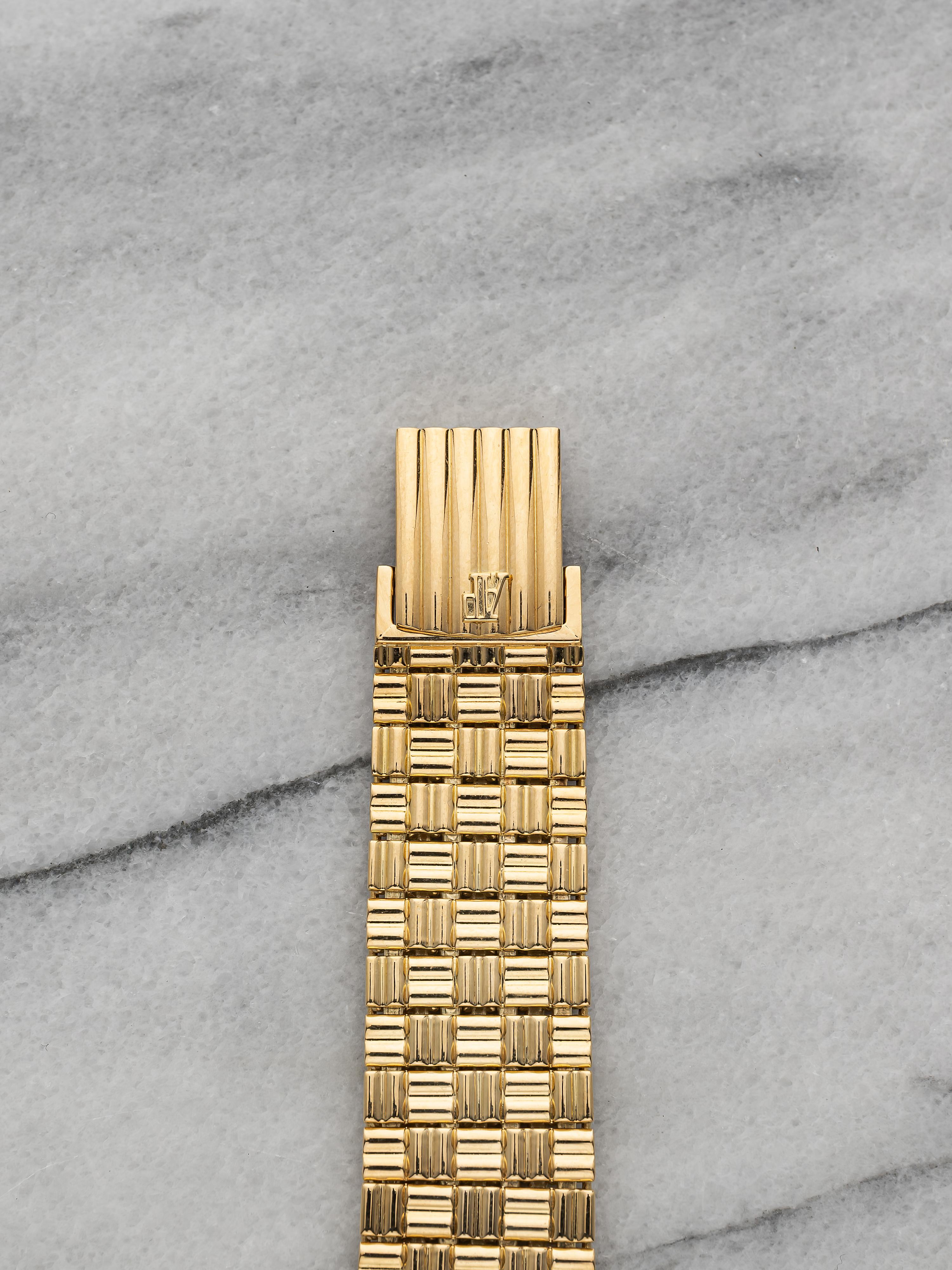 Femenino o masculino Vintage Audemars Piguet Puzzle años 90 Esfera champán Cuerda manual Oro de 18 quilates Caja de 28 mm en venta