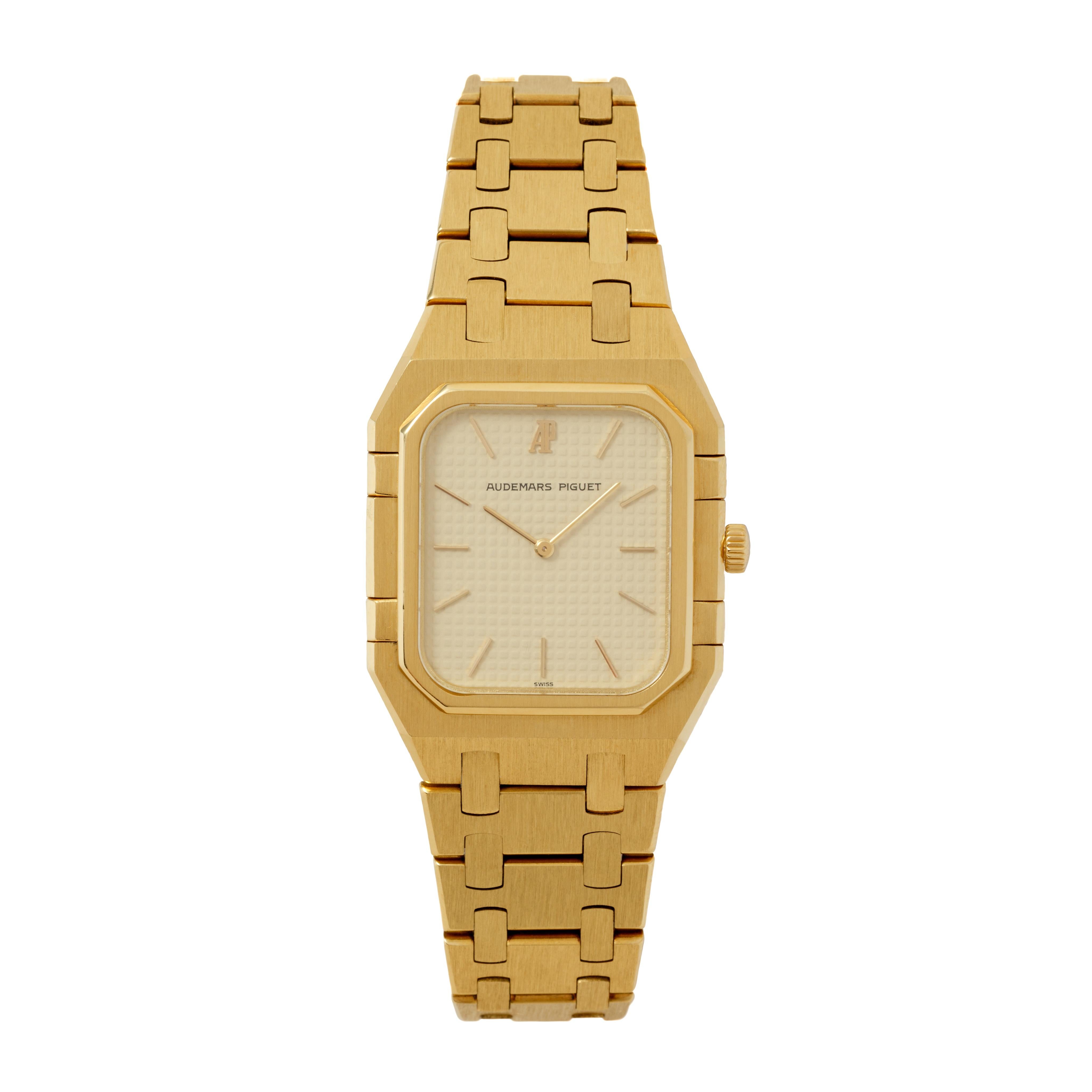 Maker: Audemars Piguet
Model: Royal Oak
Year: 1995
Material: 18 Karat Yellow Gold
Dial: Tapisserie
Case Measurement: W 28.5mm x H 38.25mm
Movement: Quartz
Condition: Very good Vintage Condition
Weight: 111 Grams
Size: Adjustable, Fits Up to 7.2