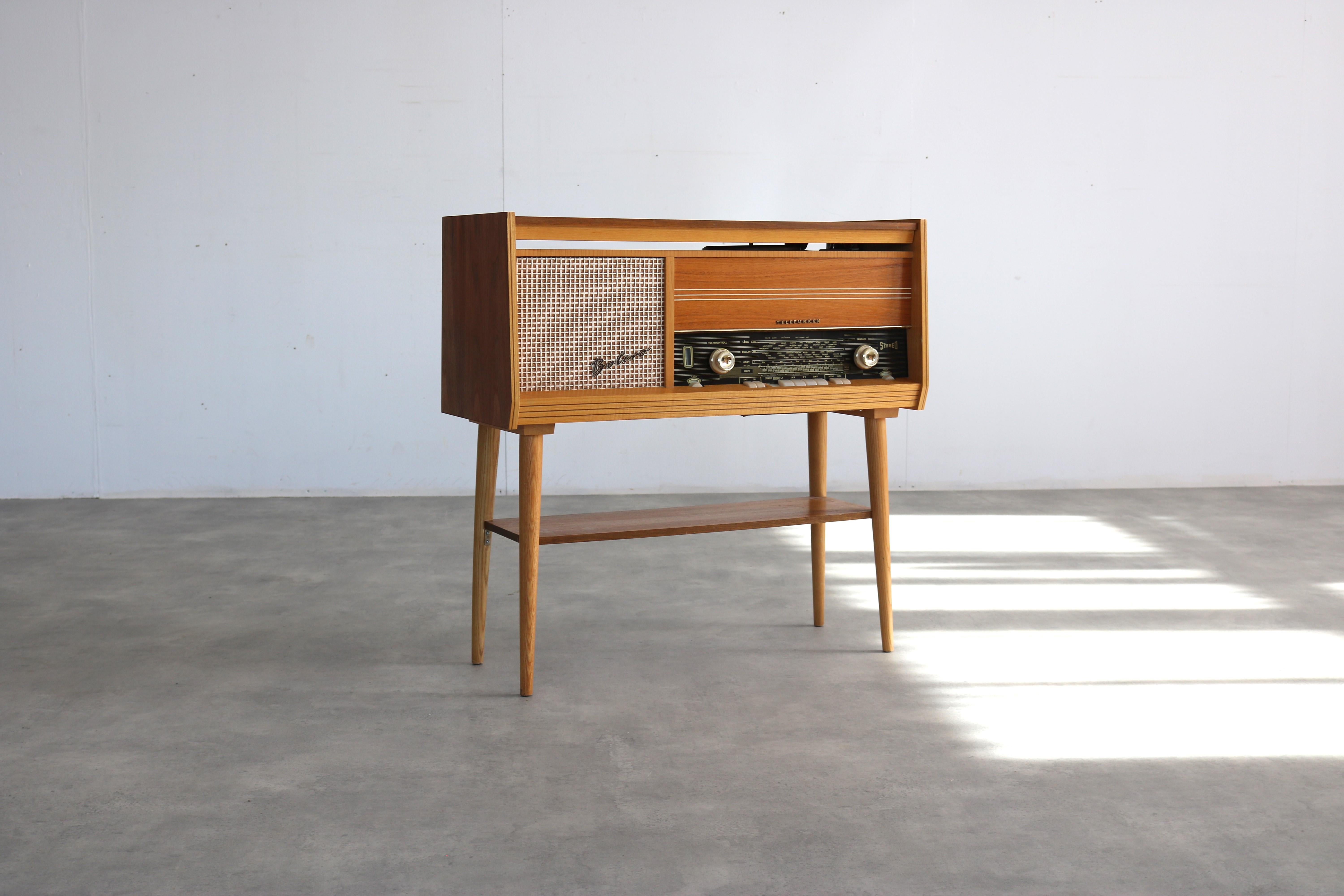vintage audio furniture  side table  Telefunken  Sweden

period  60's
design  Telefunken  Bolero  Sweden
condition  good  light signs of use  radio/vinyl player not working and needs to be checked if useable;
size  70 x 80 x 40 (hxwxd)

details 