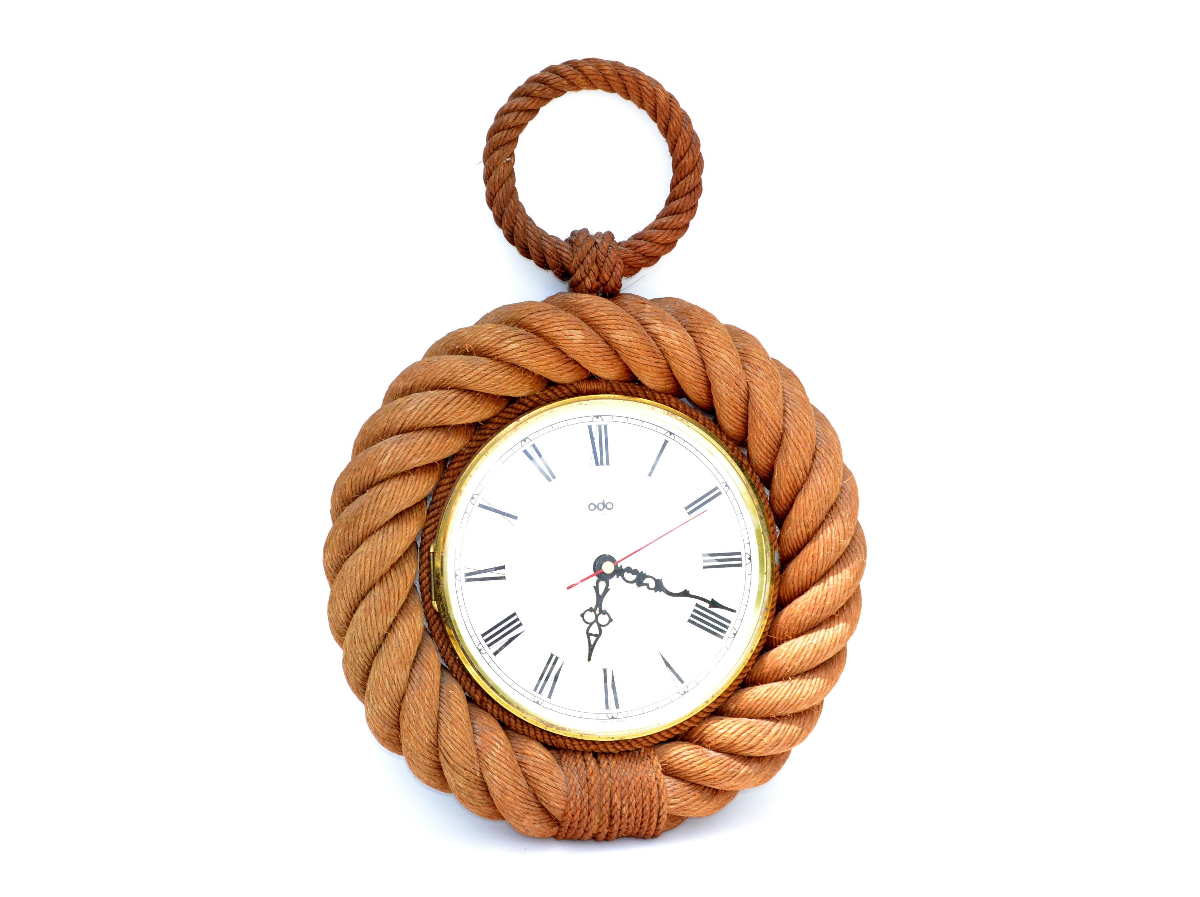 Vintage Audoux Minet style nautical wall rope clock shaped in form of a pocket watch France.
Marked LIC ATO / odo / made in France.
The clock has not been tested.