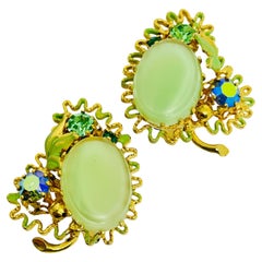 Vintage AUSTRIA gold tone enamel green glass designer clip on earrings