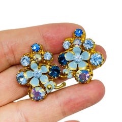 Vintage AUSTRIA gold tone enamel rhinestone flower designer clip on earrings