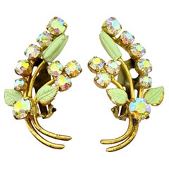 Strass d
epoca AUSTRIA in tonalità oro e smalto verde  orecchini a clip di design