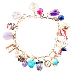 Vintage Austrian Charm Bracelet solid 14K/18K Gold 20 Charms / 19cm /23.5gr