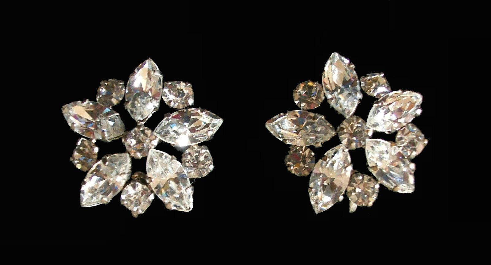 Vintage extraordinary quality Austrian crystal earrings - set with round and pear shaped rhinestones - each screw back marked 'AUSTRIA' - unsigned - Austria - mid 20th century.

Excellent vintage condition - no loss - no damage - no repairs - minor