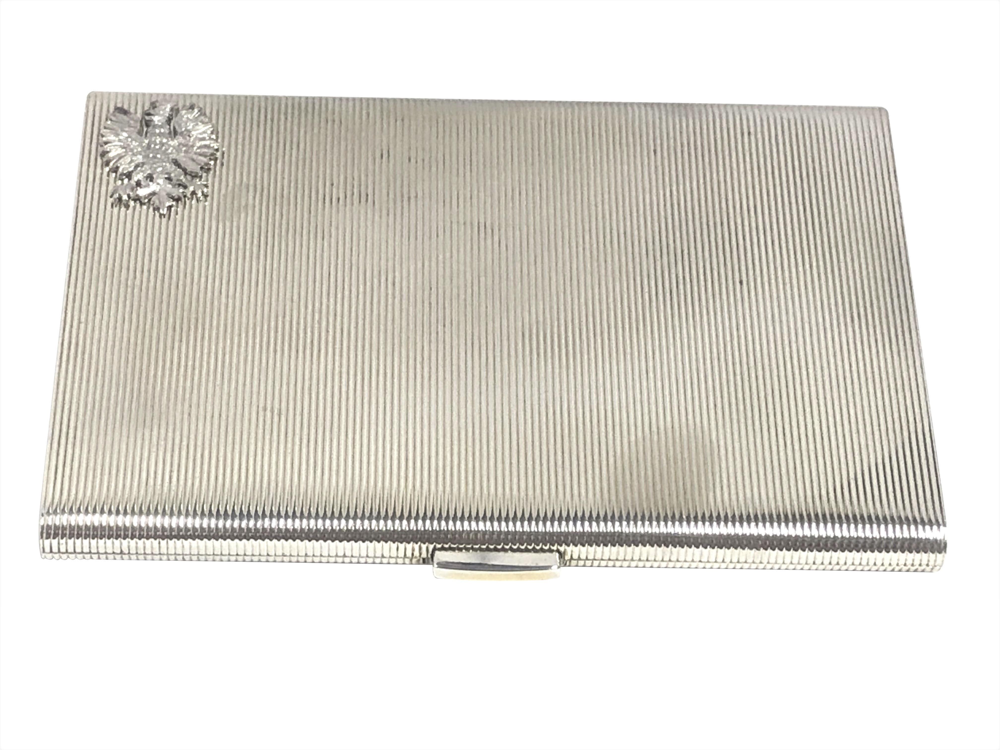 From the Estate of the Glamorous Hollywood Icon Zsa Zsa Gabor is this Circa 1940s Sterling Silver Cigarette Case, measuring 4 3/4 X 3 1/4 inches, having a ribbed design, a Gold washed interior and an applied Eagle Coat of Arms possibly Hungarian,