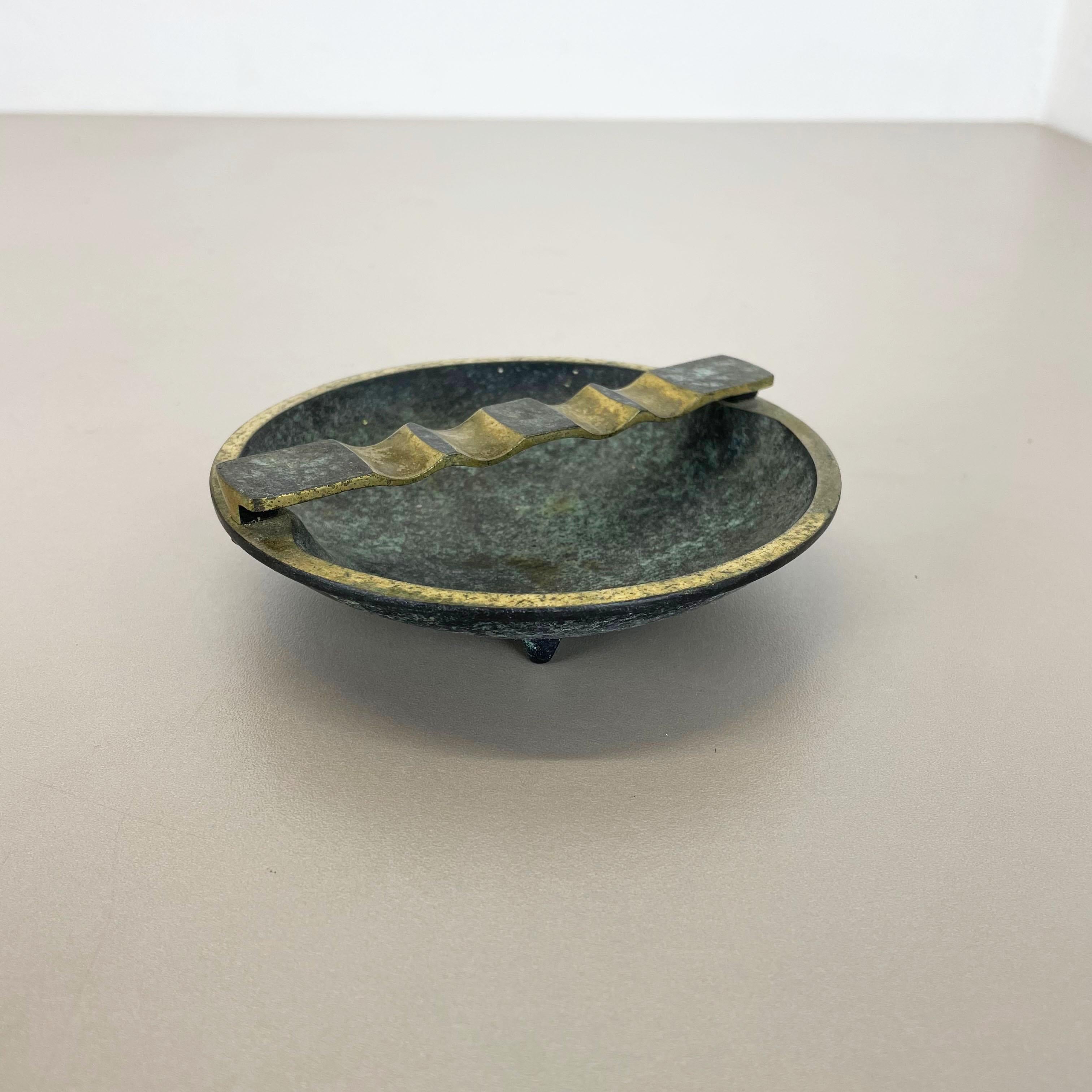 Article:

brass Ashray element


Origin:

Austria


Material:

brass metal


Description:

Wonderful metal ashtray element made in Austria in the 1950. High quality 1950s Austrian handmade fabrication of brass metal, with a