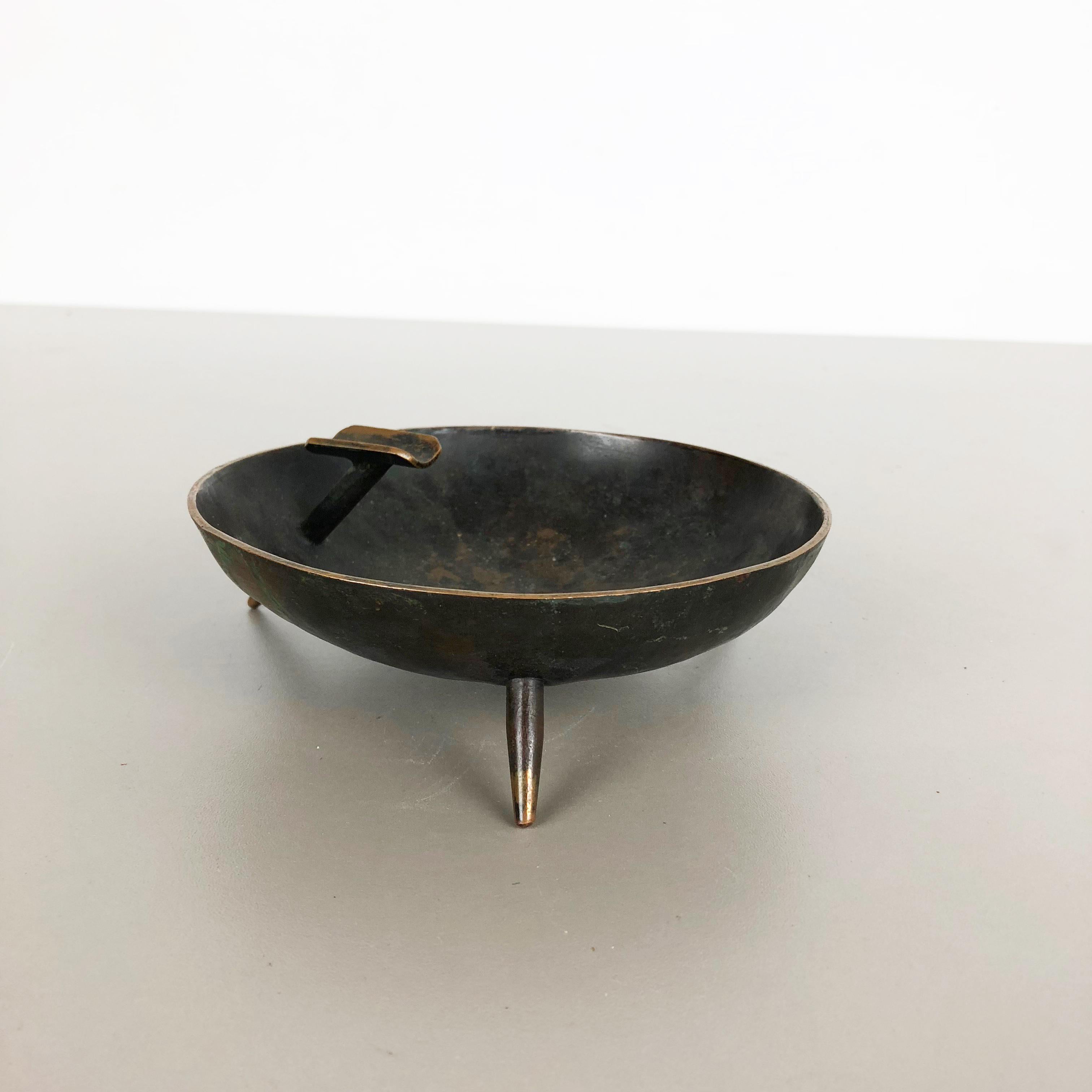 Article:

Copper Ashray element


Origin:

Austria


Material:

Copper


Description:

Wonderful metal ashtray element made in Austria in the 1950. High quality 1950s Austrian handmade fabrication of solid copper, which is blacked at the top side