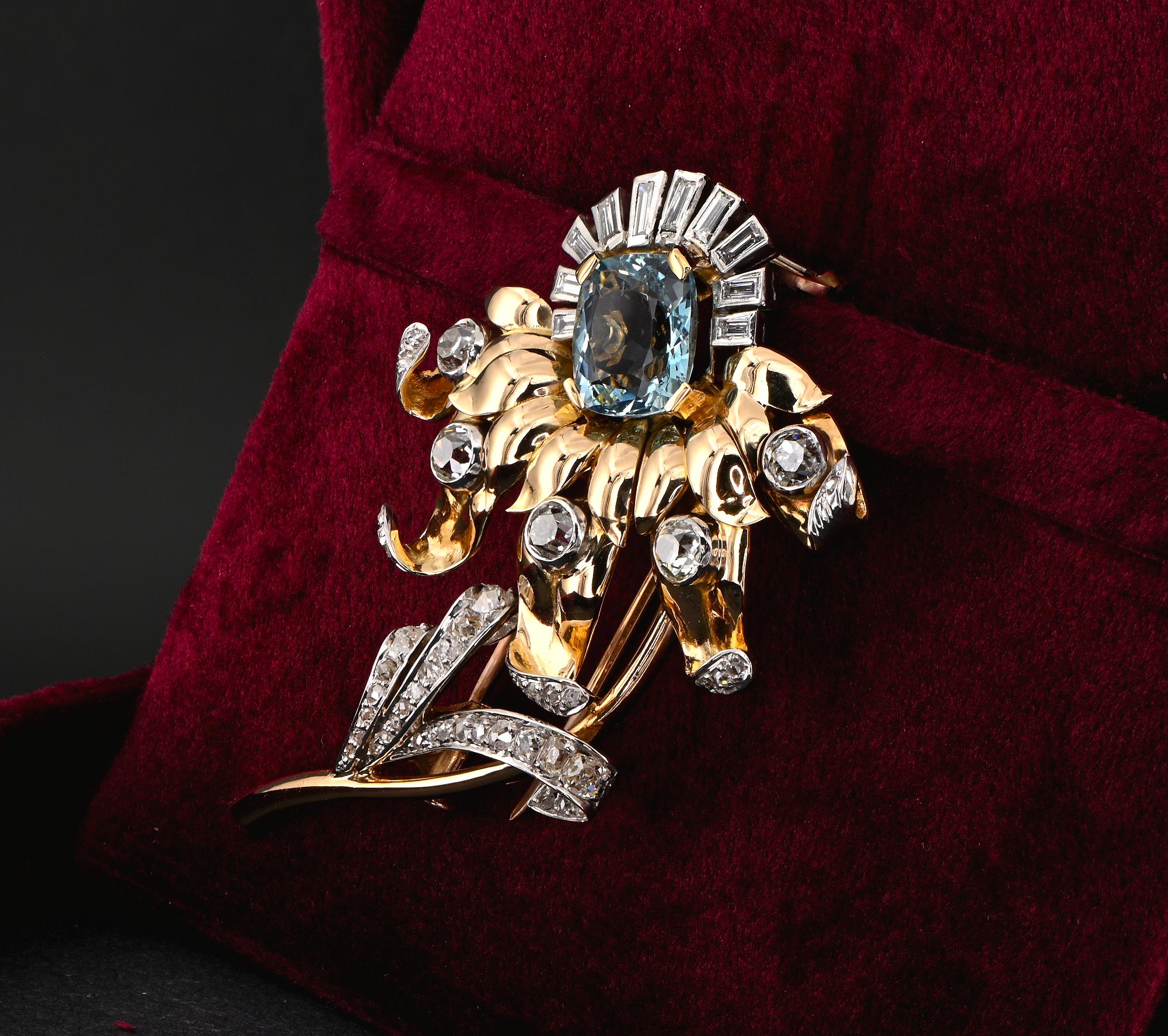 This impressive vintage brooch is 1935 ca.
Hand crafted of solid 18 Kt gold and Platinum bearing Austro Hungarian hallmarks
Artful designed as a marvelous rare flower with long curly petals around the gem set core and folded leaf group to