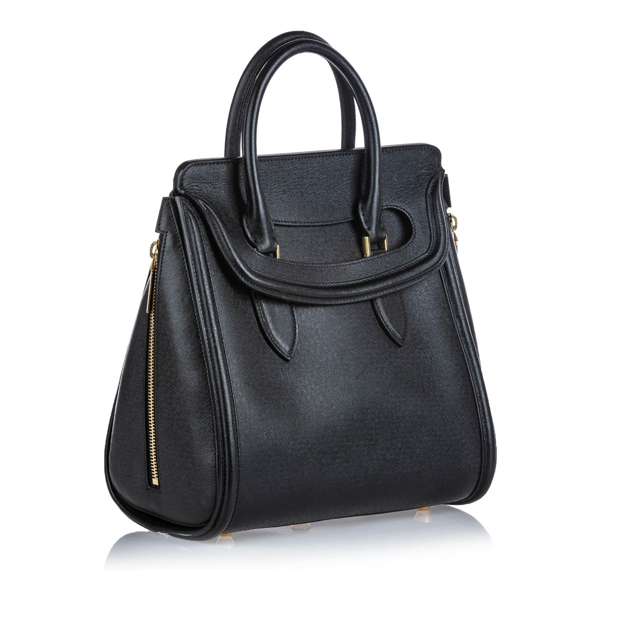 This Heroine satchel features a leather body, rolled leather handles, a top flap closure, and an interior zip pocket. It carries as AB condition rating.

Inclusions: 
This item does not come with inclusions.

Dimensions:
Length: 28.00 cm
Width: