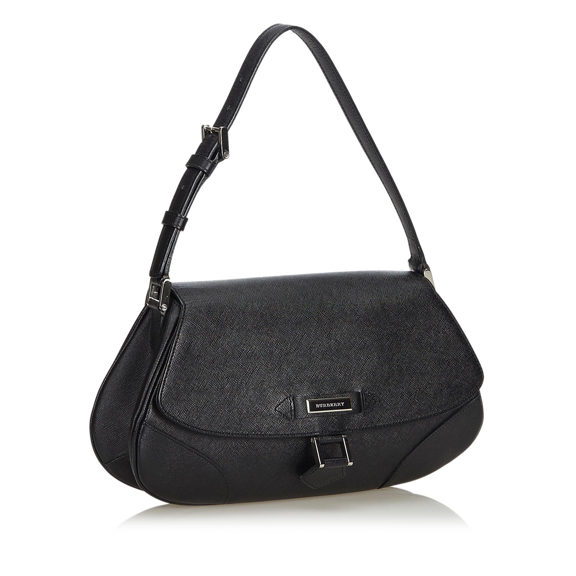 This handbag features a leather body, a flat leather strap, a top flap with a magnetic closure, and interior zip and slip pockets. It carries as A condition rating.

Inclusions: 
This item does not come with inclusions.

Dimensions:
Length: 18.00