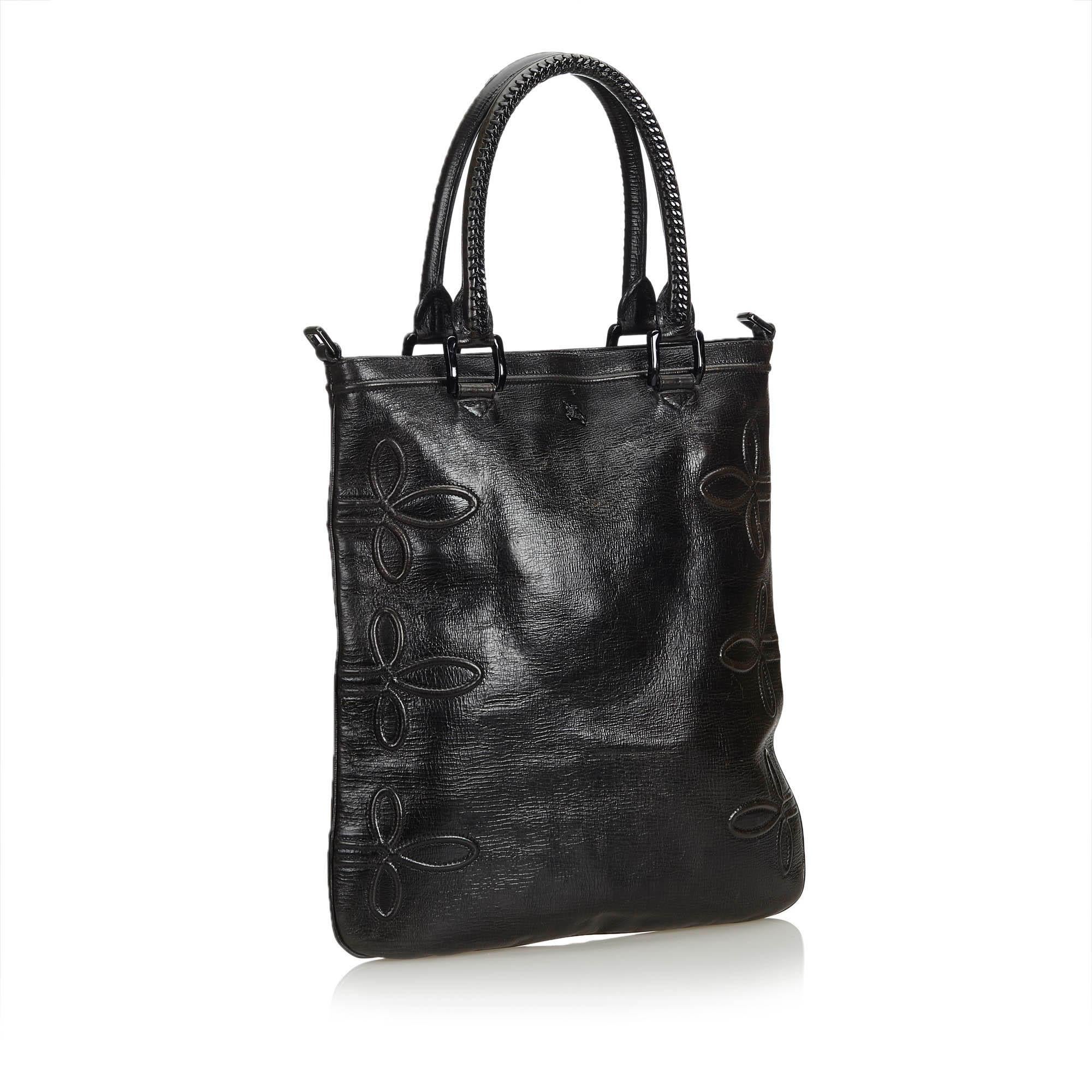 This tote bag features a leather body, rolled leather handles, a top zip closure, and interior zip and slip pockets. It carries as B+ condition rating.

Inclusions: 
This item does not come with inclusions.

Dimensions:
Length: 45.00 cm
Width: 37.00