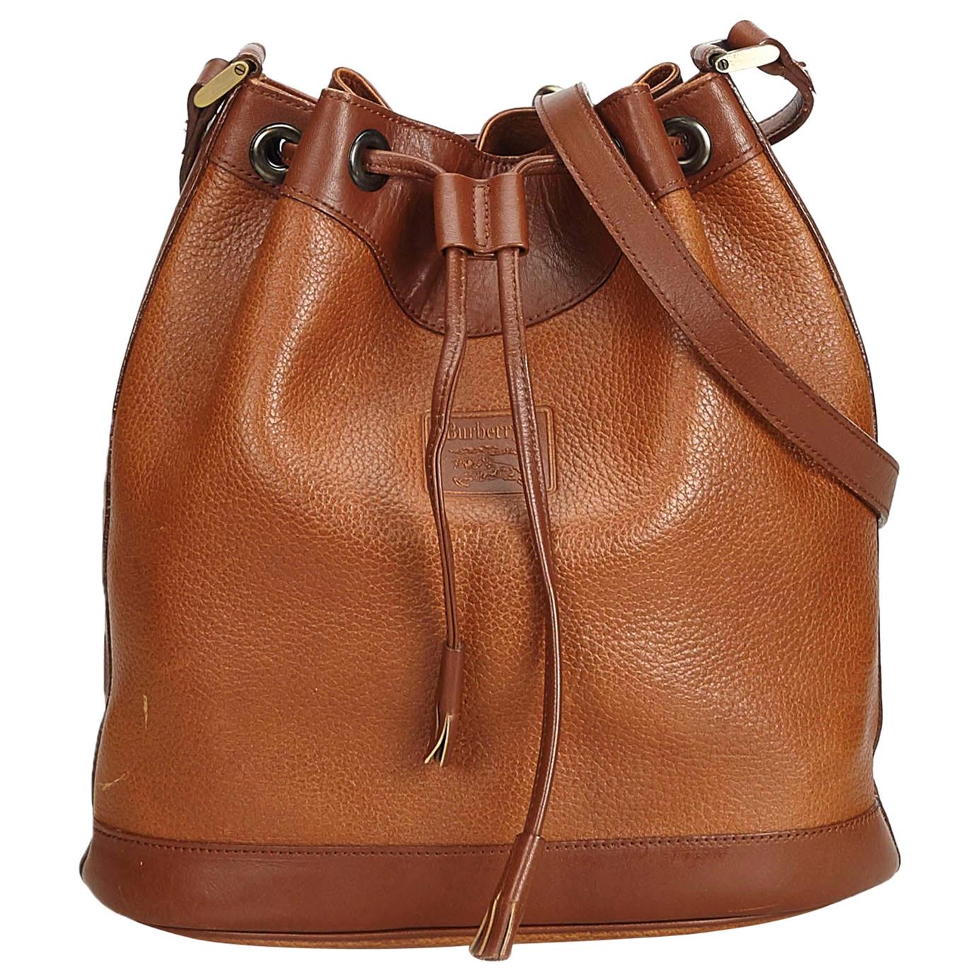Burberry Brown/Cream Woven Leather Drawstring Bag at 1stDibs