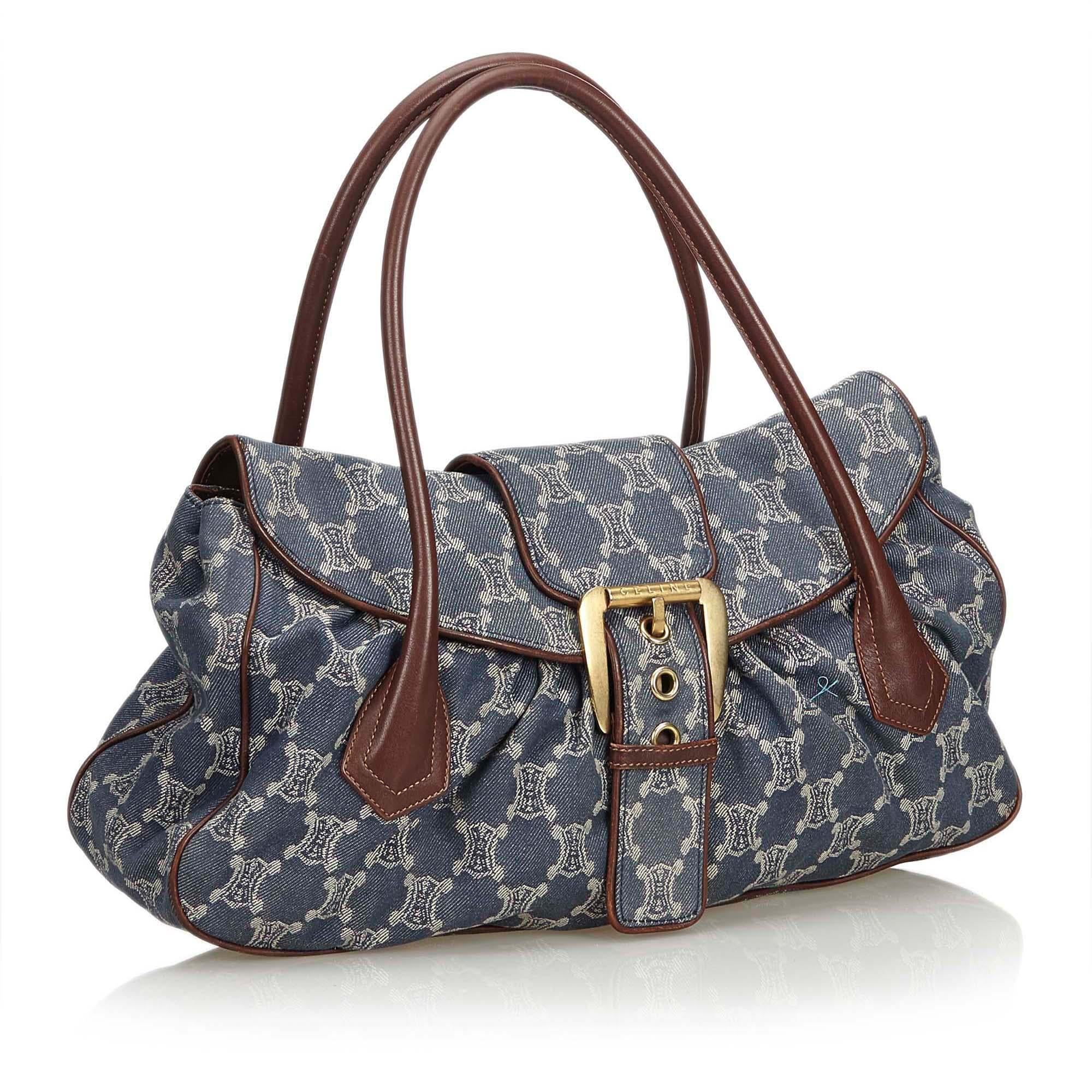 This shoulder bag features a denim body, exterior flap pockets with magnetic closures, flat shoulder straps, a top zip closure, and an interior zip pocket. It carries as B+ condition rating.

Inclusions: 
This item does not come with