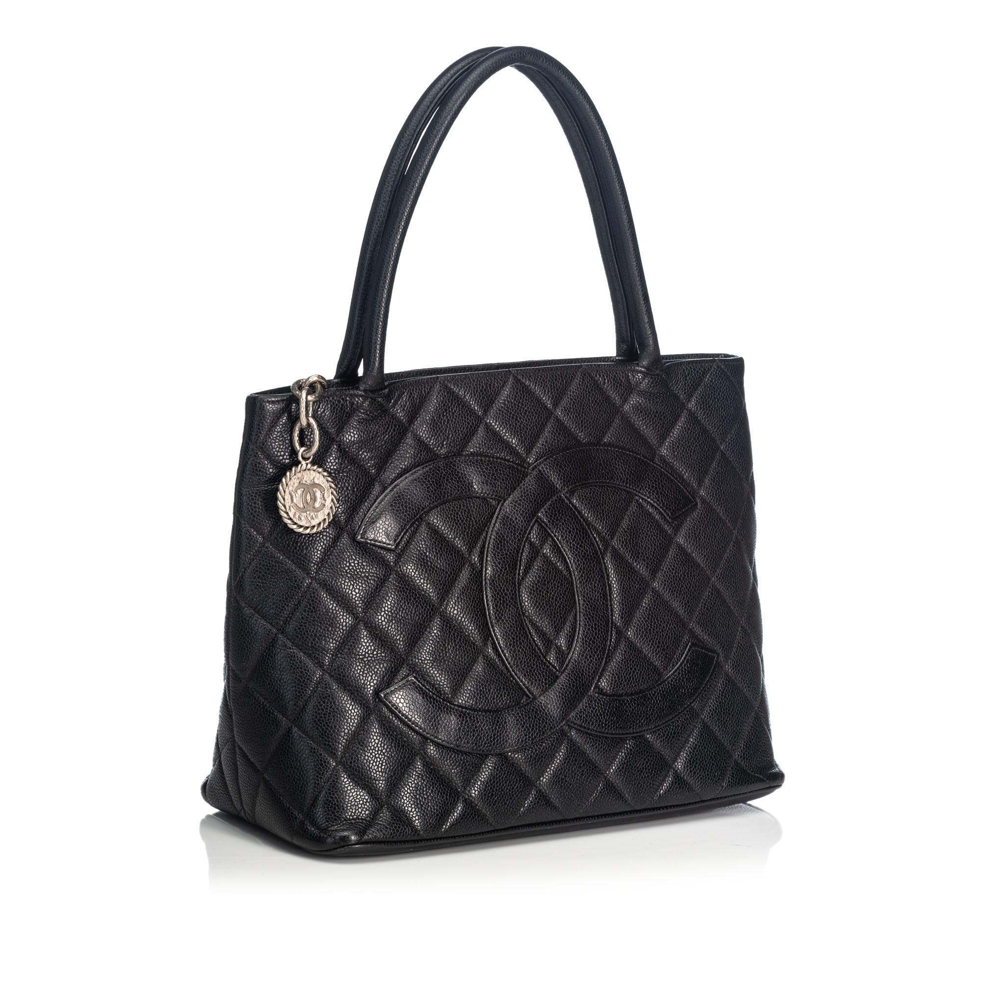 The Medallion tote features a quilted caviar leather body, rolled leather handles, a top zip closure, exterior back slip pocket, and an interior zip pocket. It carries as B+ condition rating.

Inclusions: 
This item does not come with