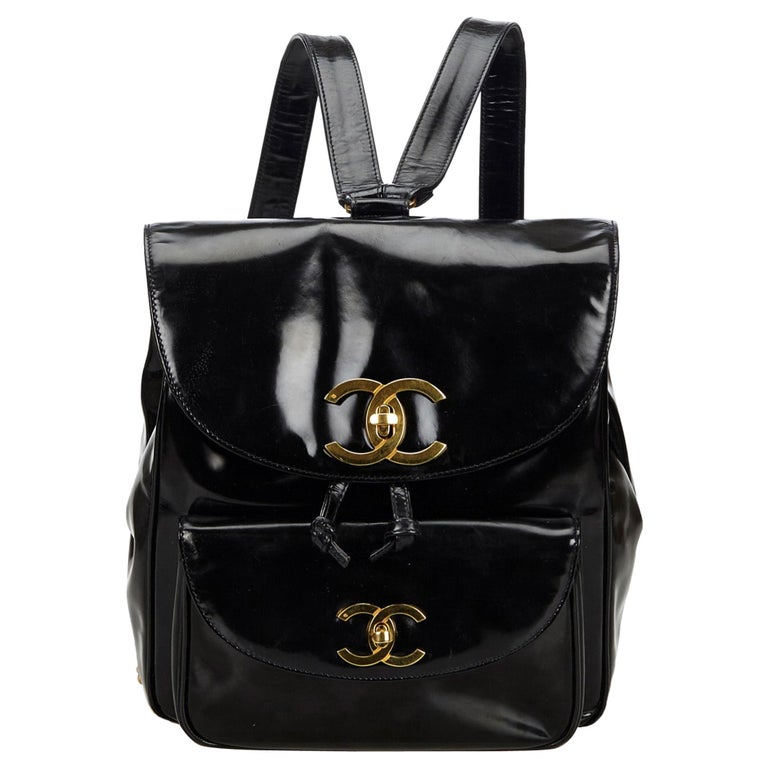 Vintage Authentic Chanel Black Patent Leather Drawstring Backpack