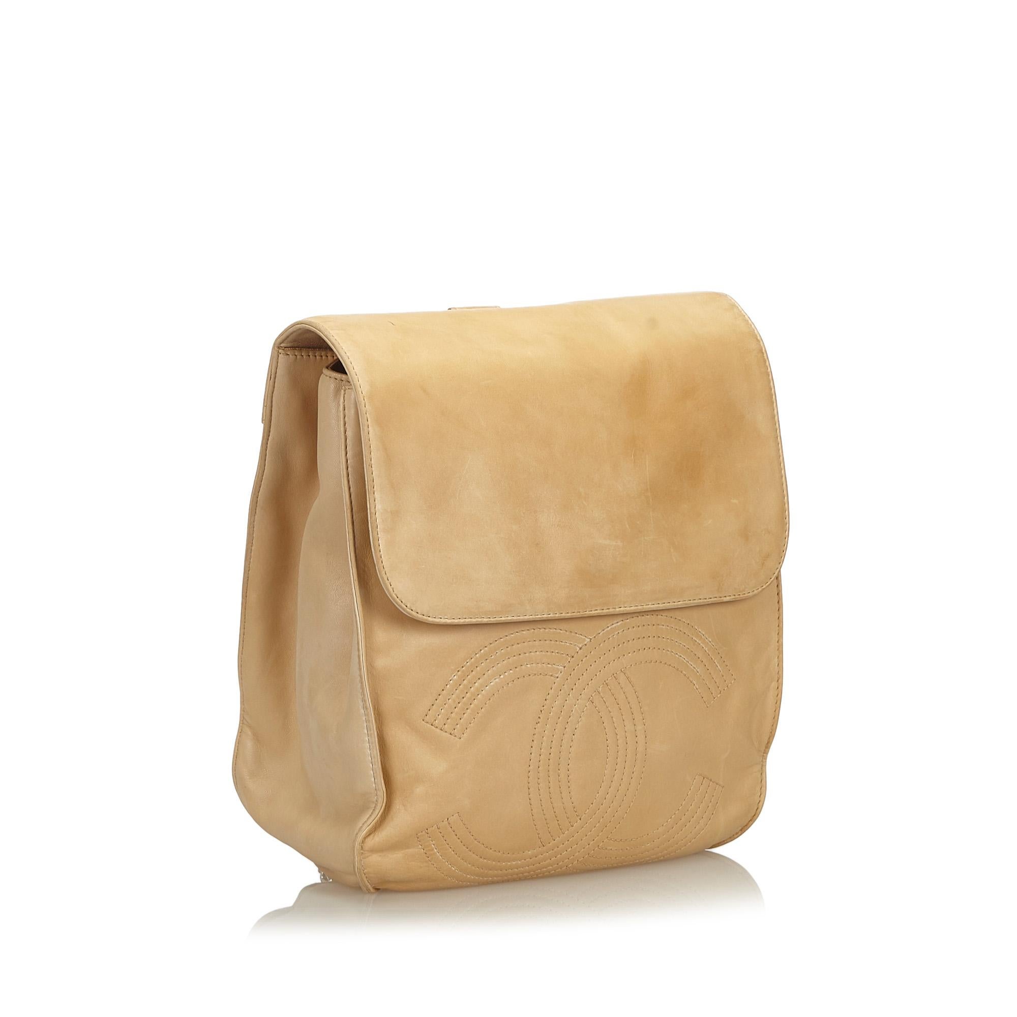 This backpack features a lambskin leather body, flat back straps, a front flap with a magnetic closure, and interior zip and slip pockets. It carries as B condition rating.

Inclusions: 
Authenticity Card

Dimensions:
Length: 35.00 cm
Width: 26.00