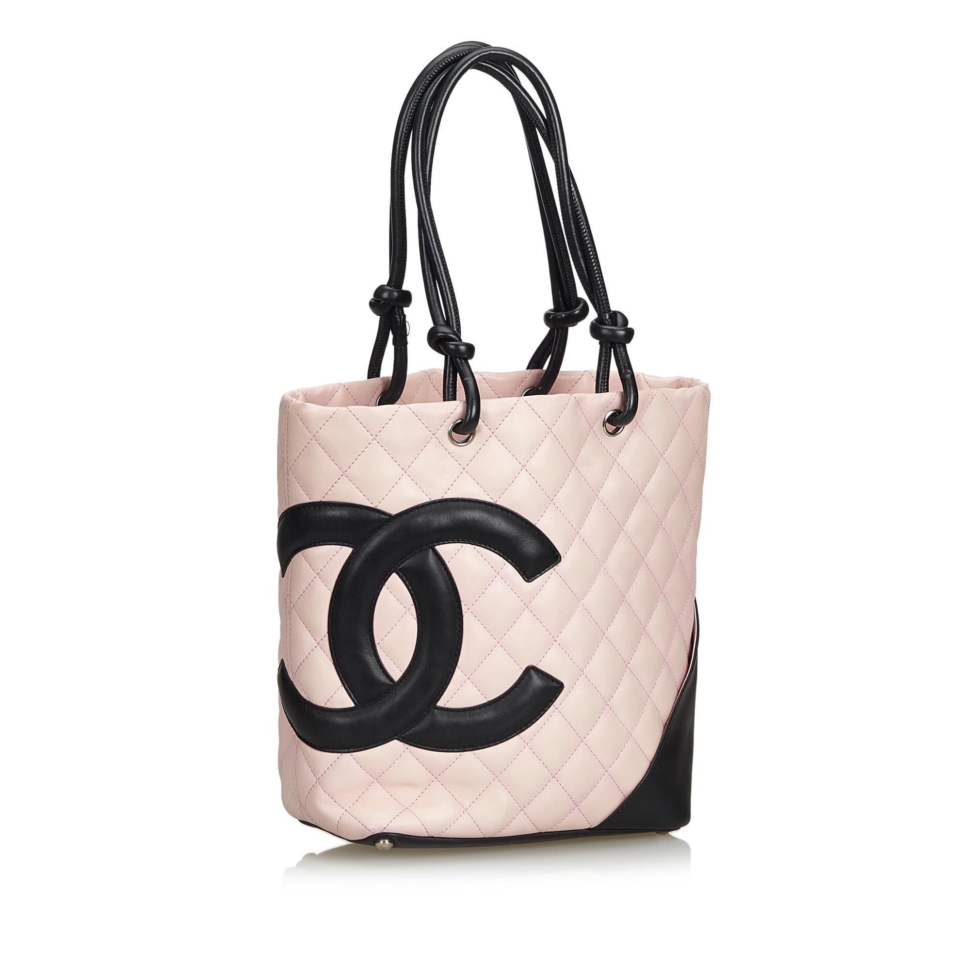The Cambon Ligne tote features a quilted leather body and interlocking Cs, rolled leather handles, top zip closure, exterior back slip pocket, and interior zip pockets. It carries as B condition rating.

Inclusions: 
This item does not come with