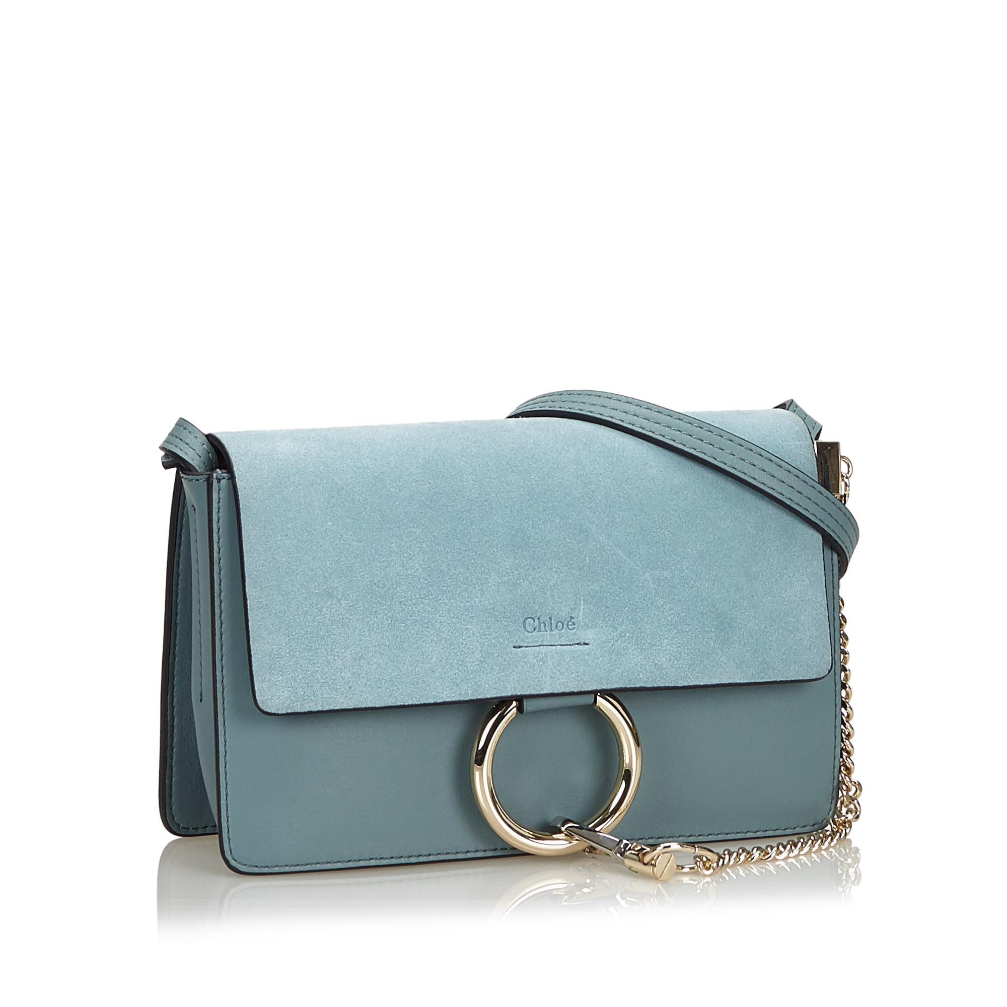 This Faye features a leather body, flat leather strap, suede top flap with a hook closure, and an interior zip pocket. It carries as AB condition rating.

Inclusions: 
This item does not come with inclusions.

Dimensions:
Length: 18.00 cm
Width: