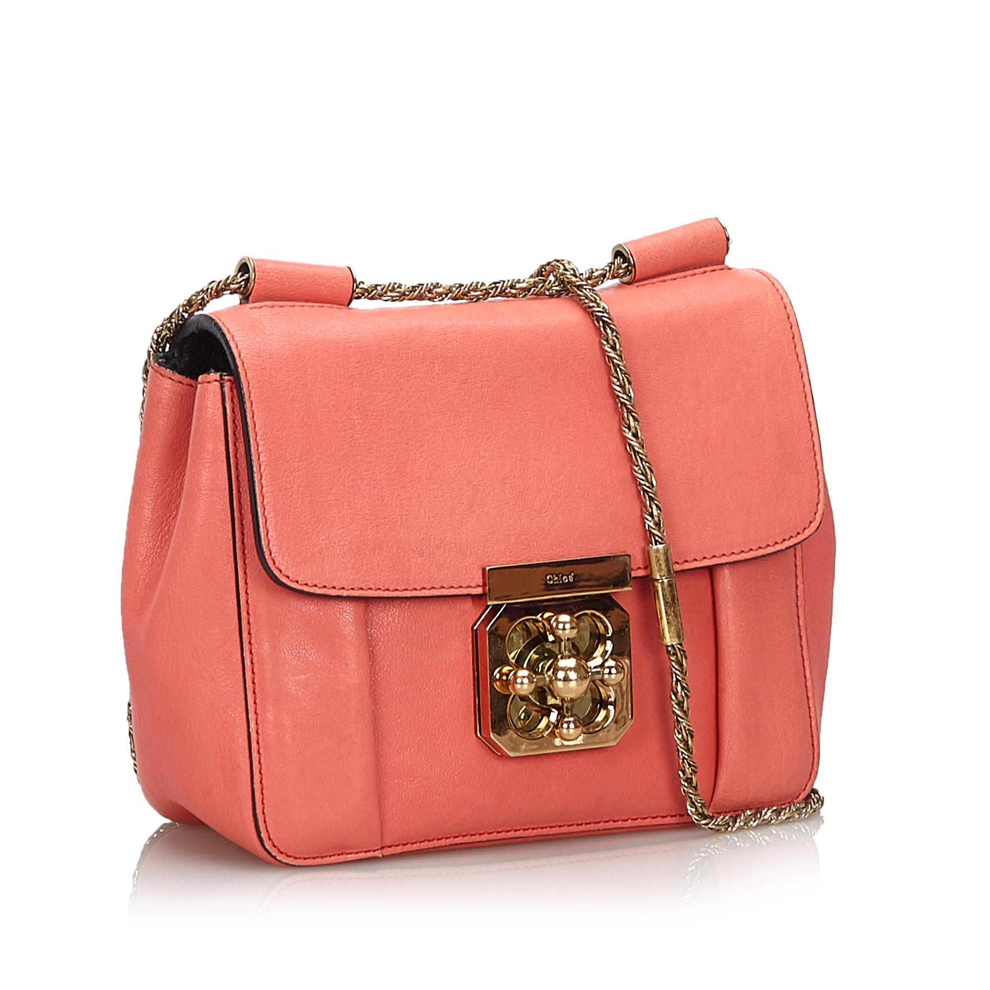 The Elsie shoulder bag features a leather body, chain link straps, a top flap with a twist lock closure, and an interior slip pocket. It carries as B+ condition rating.

Inclusions: 
This item does not come with inclusions.

Dimensions:
Length: