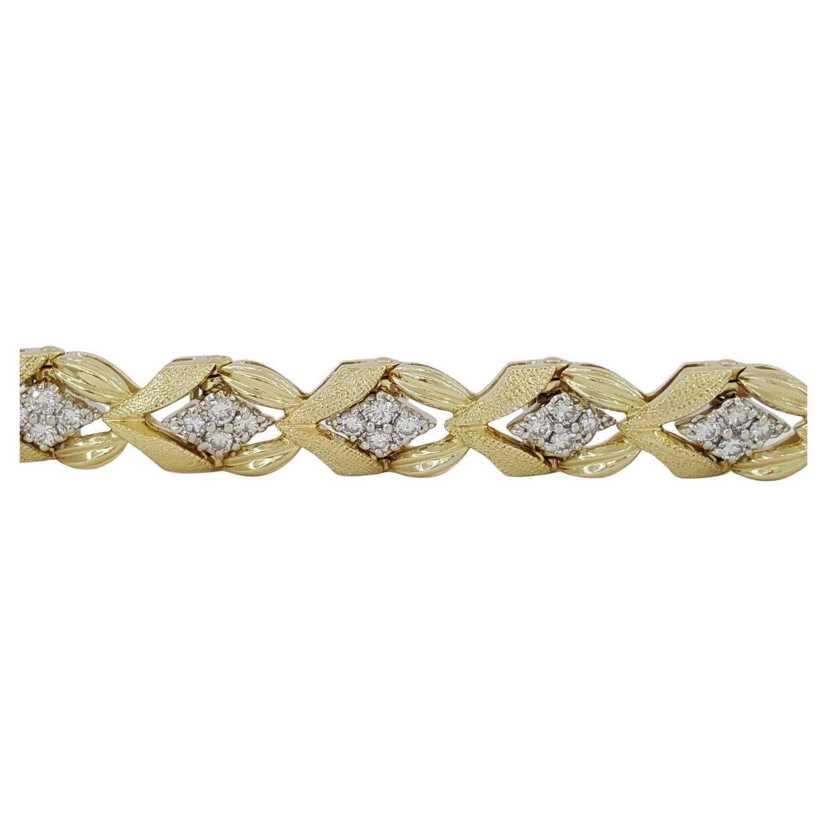 Vintage 1.76 ct total weight 14K Yellow Gold Round Brilliant Cut Diamond Ribbon Tennis Bracelet. 

The bracelet weighs 31.1 grams, 6