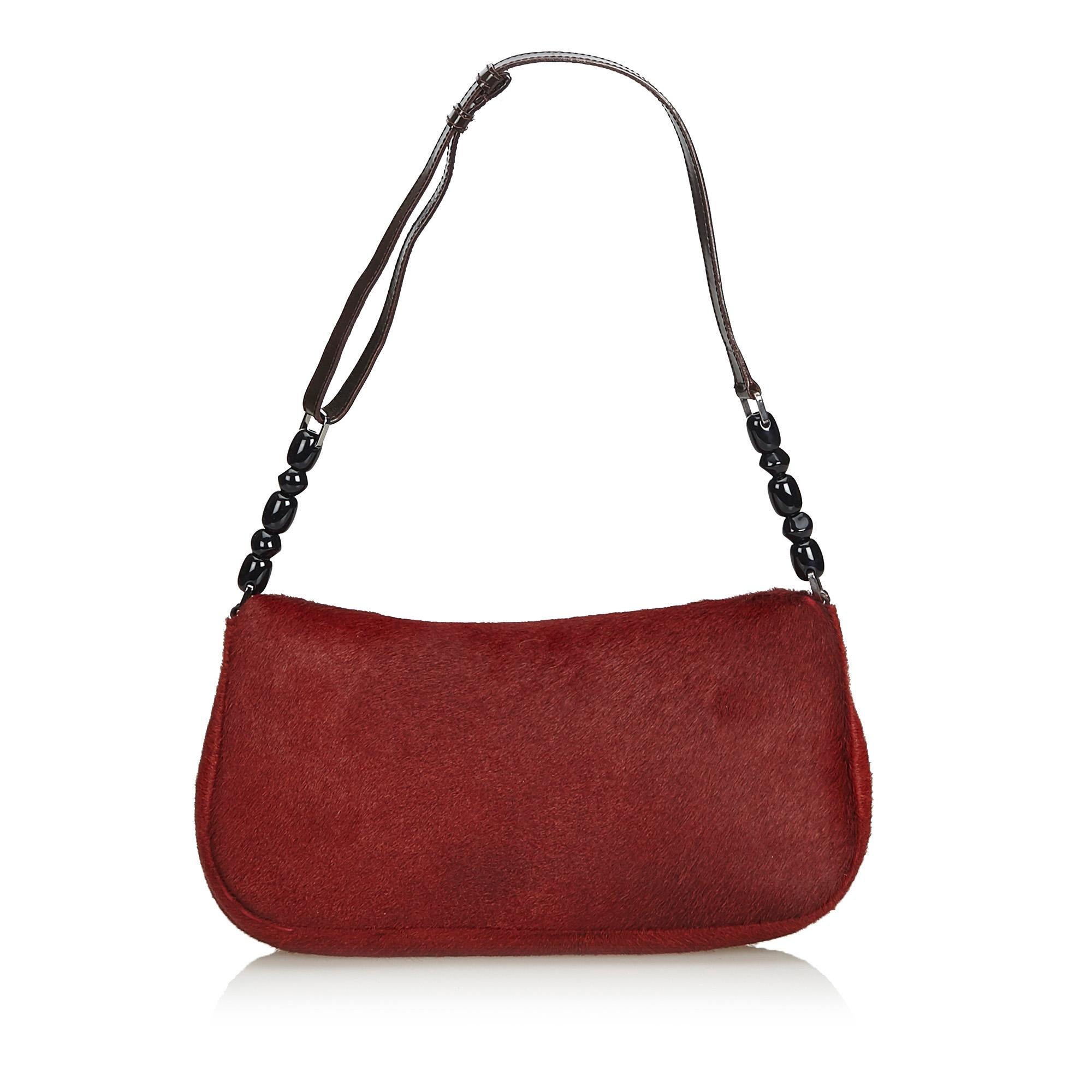 dark red baguette bag