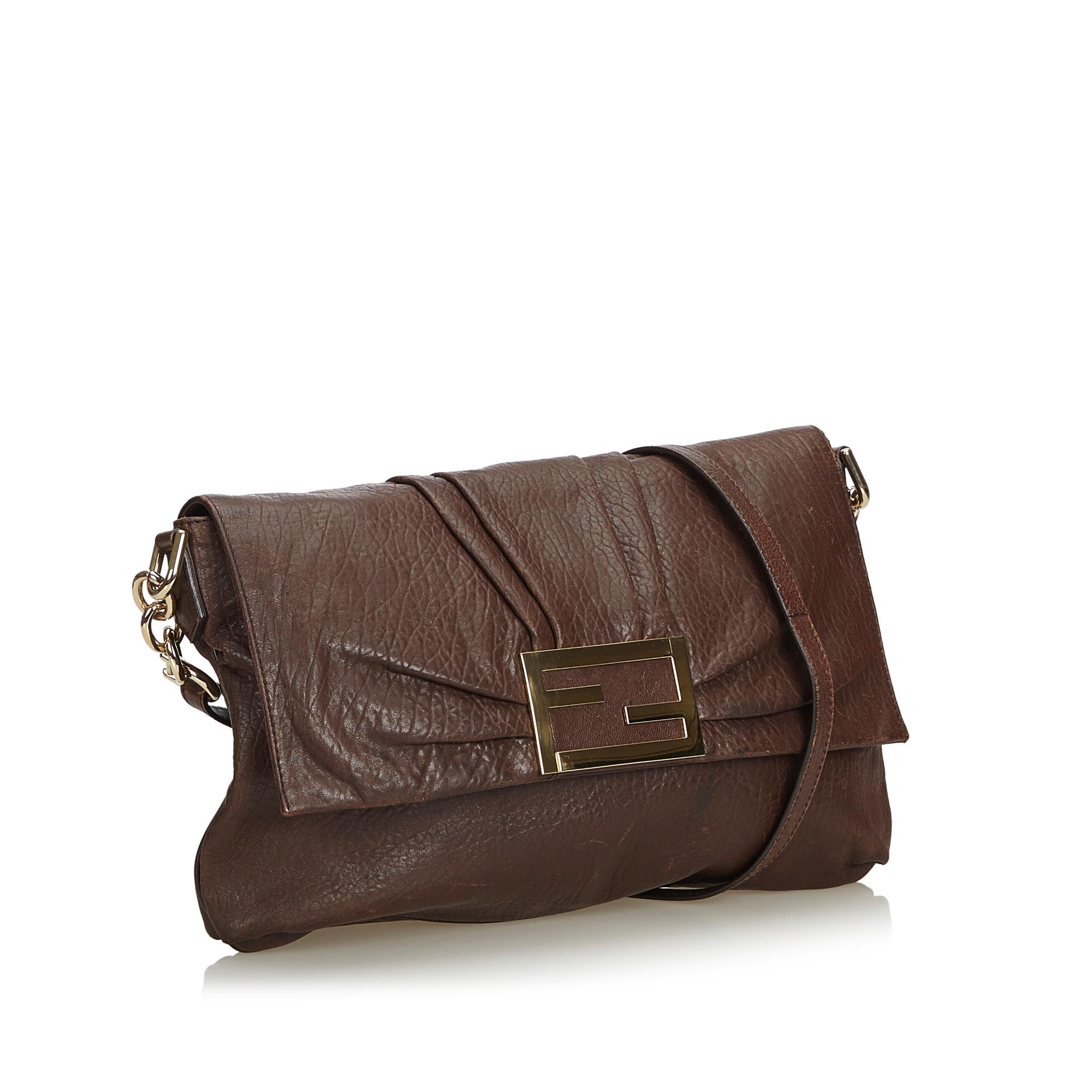 The Mia crossbody bag features a leather body, an adjustable flat strap, a front flap with a magnetic closure, and an interior zip pocket. It carries as B+ condition rating.

Inclusions: 
This item does not come with inclusions.

Dimensions:
Length: