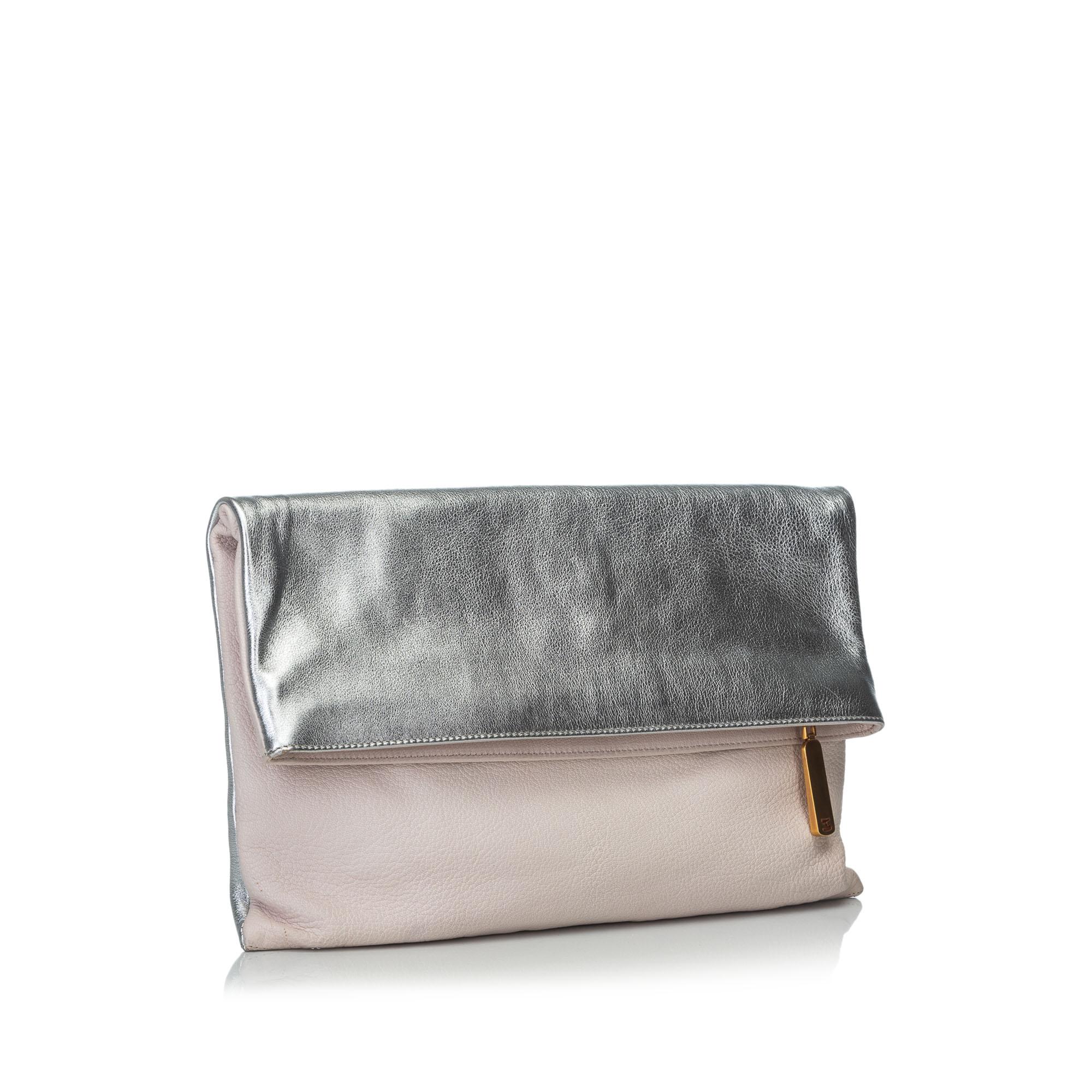 This clutch bag features a leather body, a front fold over flap, and a top zip closure, It carries as AB condition rating.

Inclusions: 
Dust Bag

Dimensions:
Length: 34.00 cm
Width: 21.00 cm
Depth: 1.00 cm

Material: Leather x Others
Country of