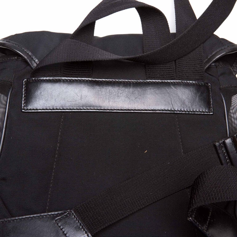 black canvas gucci backpack